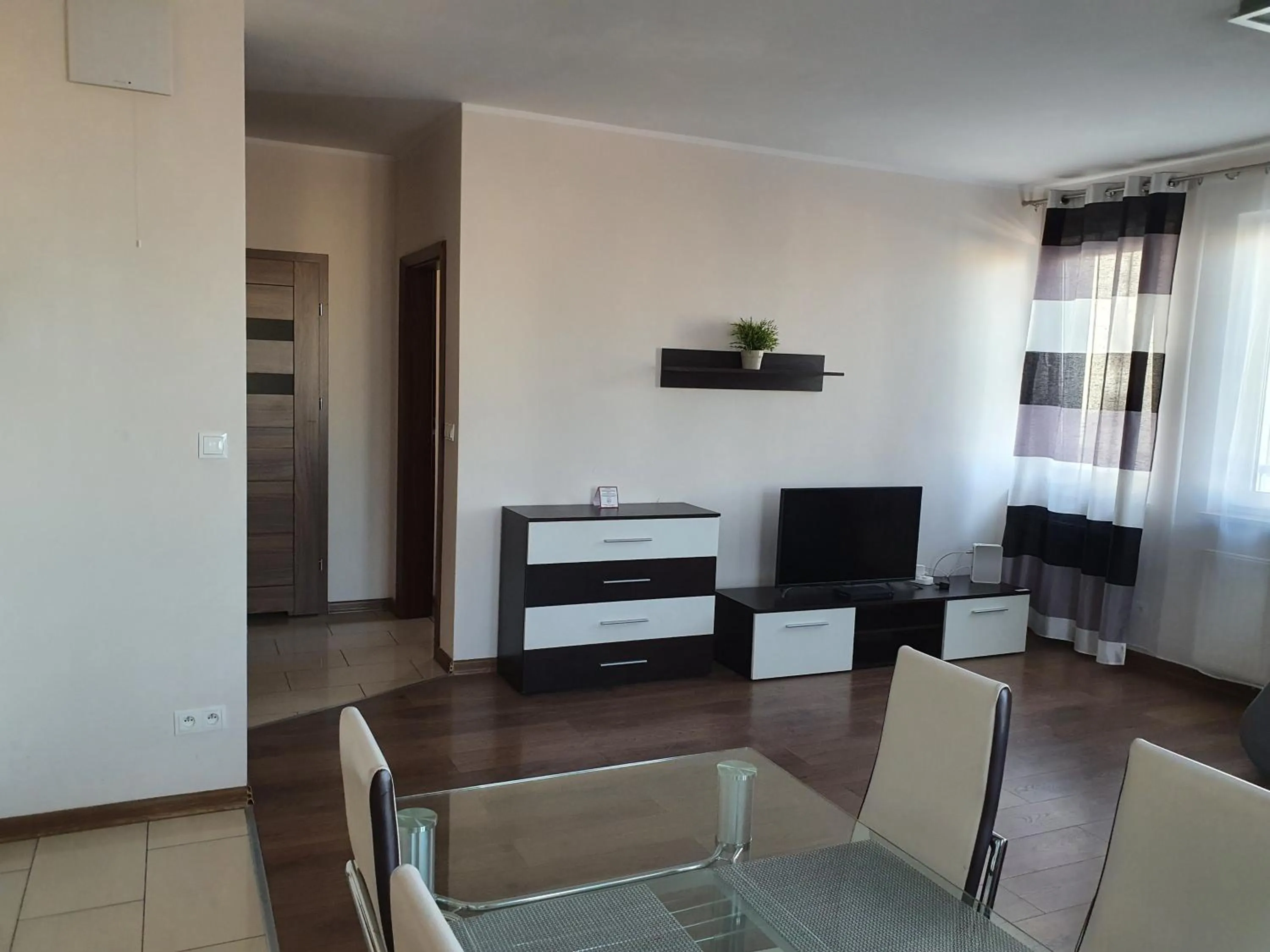 Seating Area in NotaBene Wola Apartment