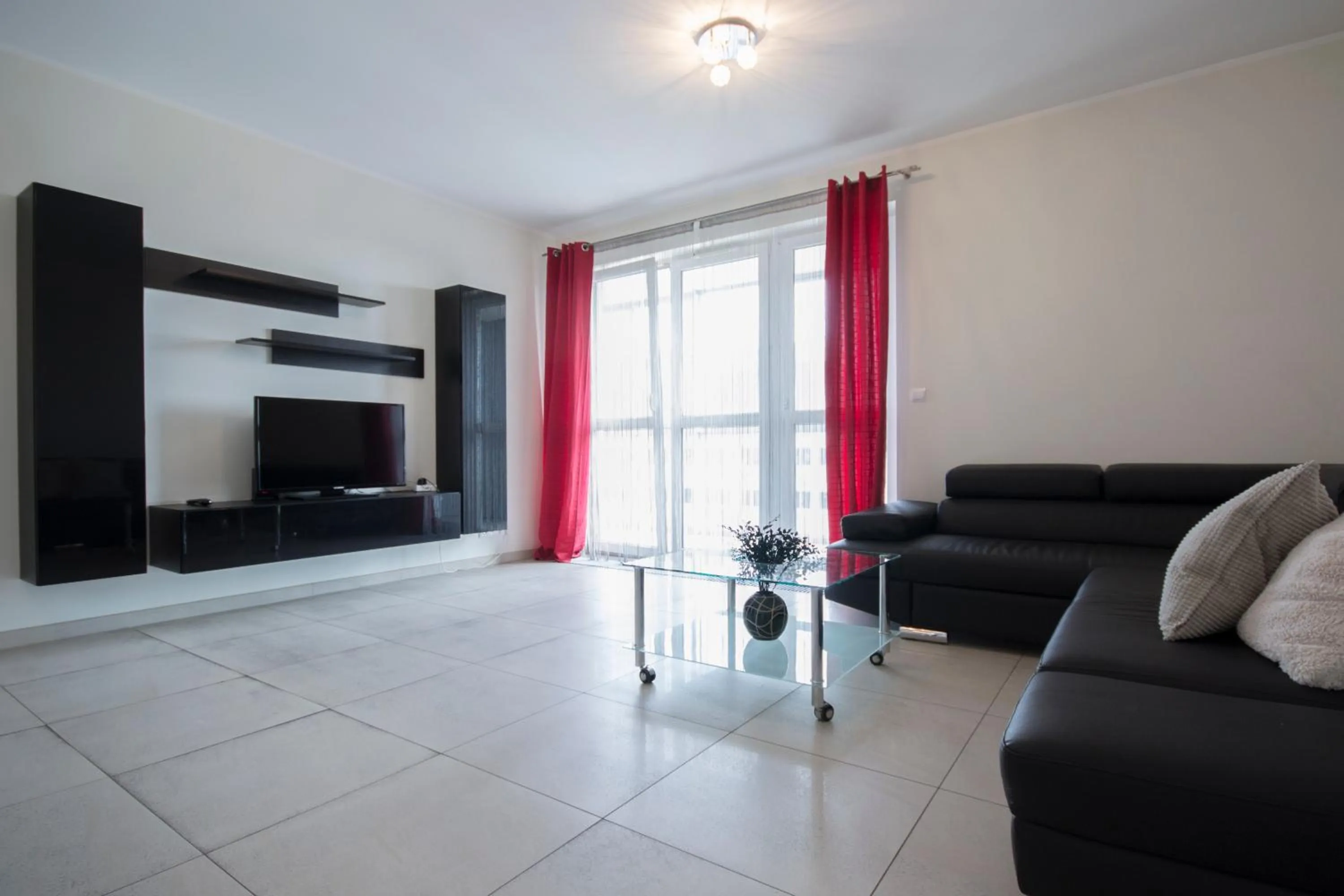 Living room, Seating Area in NotaBene Wola Apartment