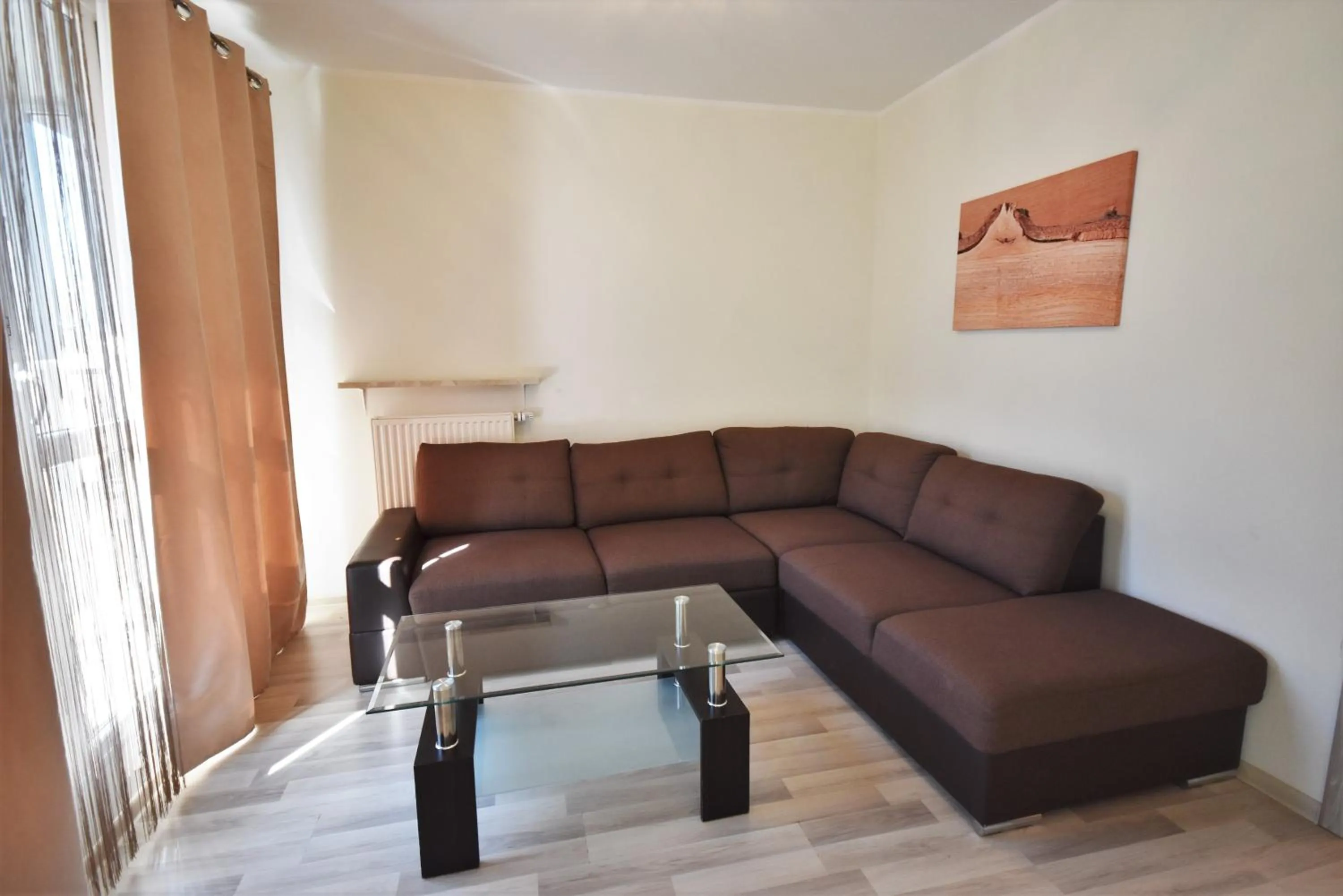 Living room, Seating Area in NotaBene Wola Apartment