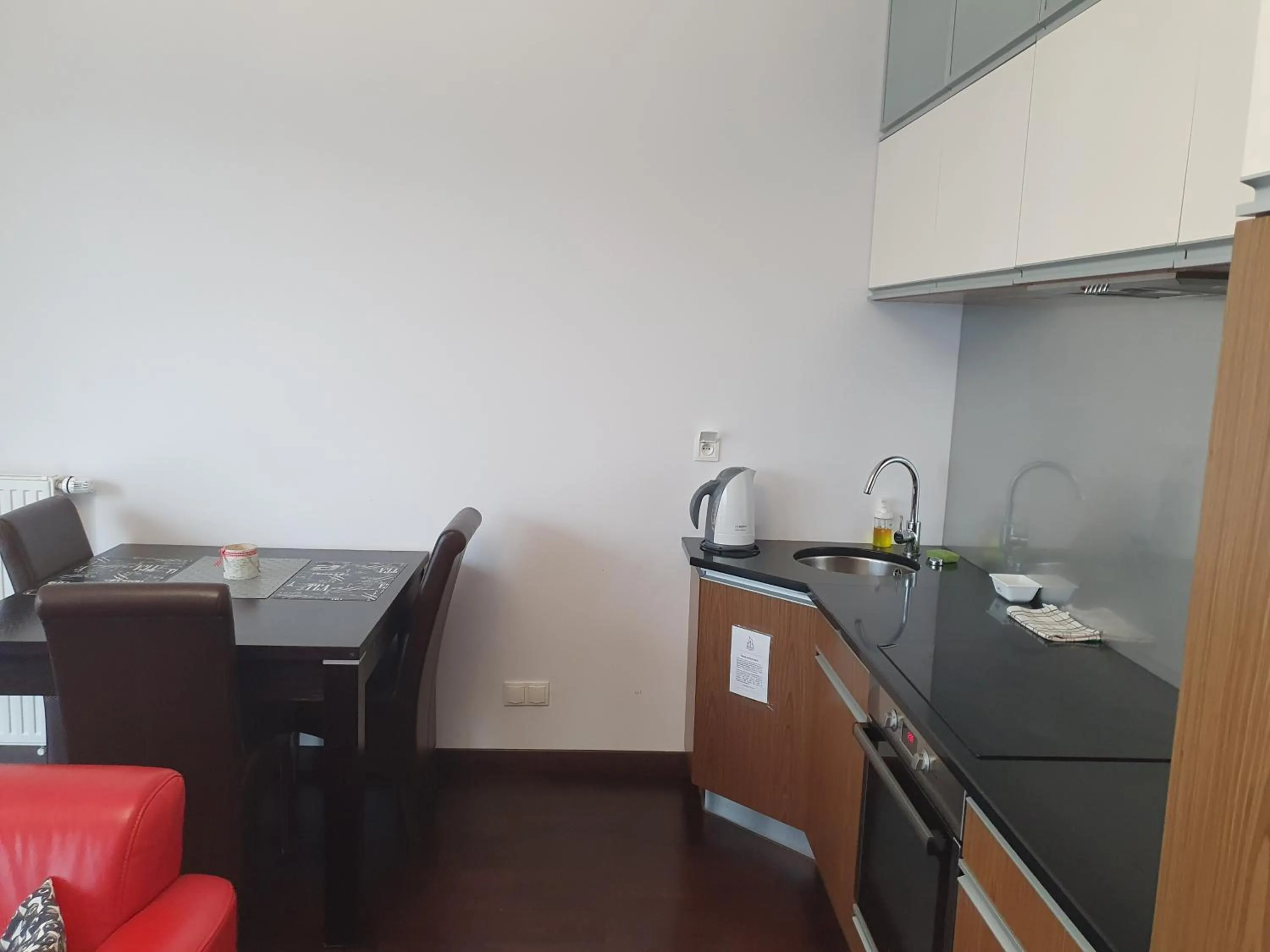 Kitchen or kitchenette, Kitchen/Kitchenette in NotaBene Wola Apartment