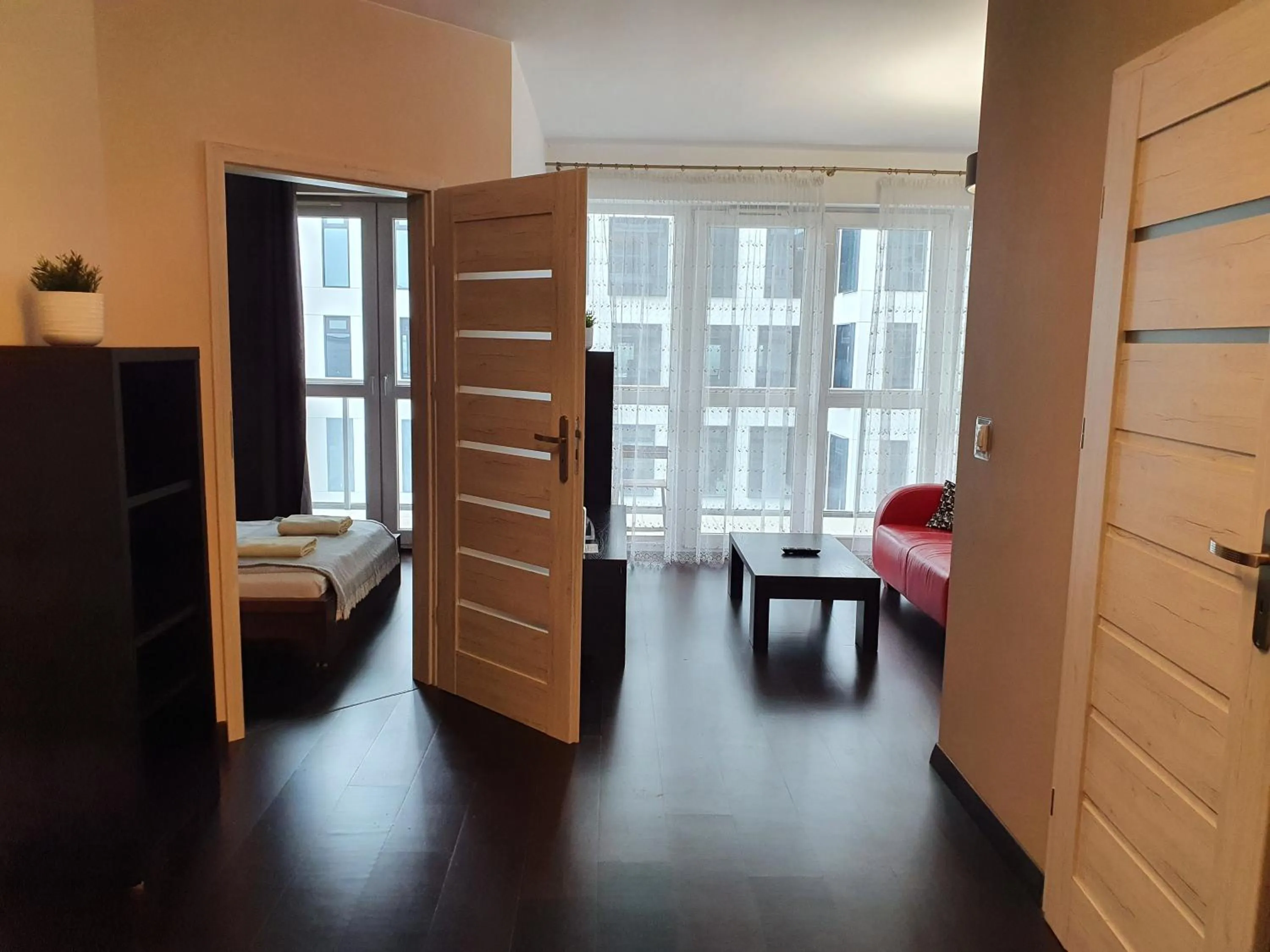 Photo of the whole room, Seating Area in NotaBene Wola Apartment