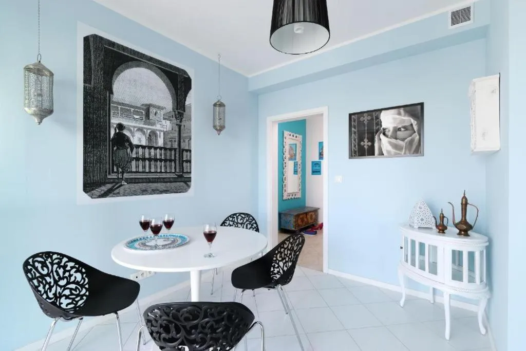 Dining Area in NotaBene Wola Apartment