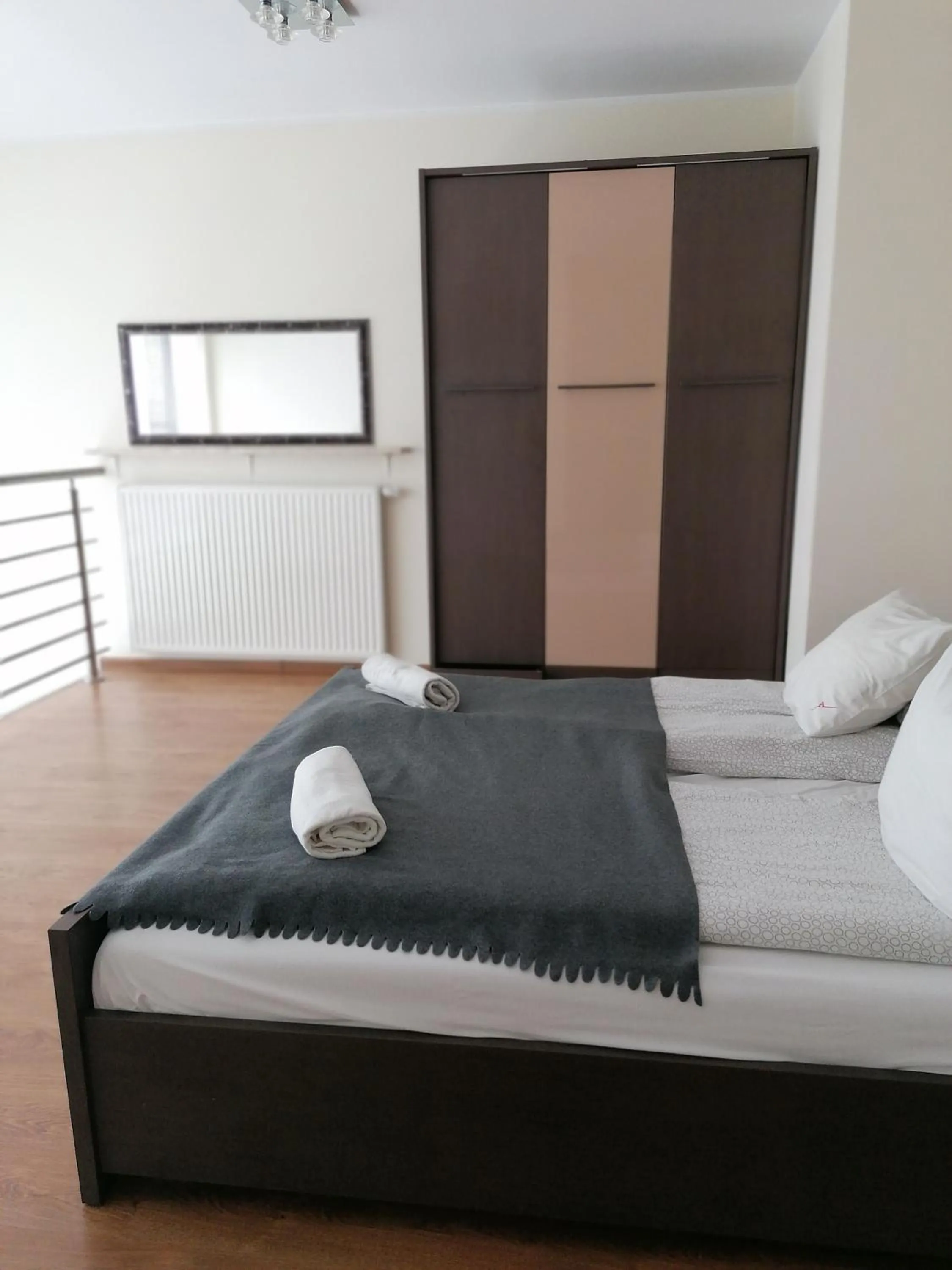 Bed in NotaBene Wola Apartment