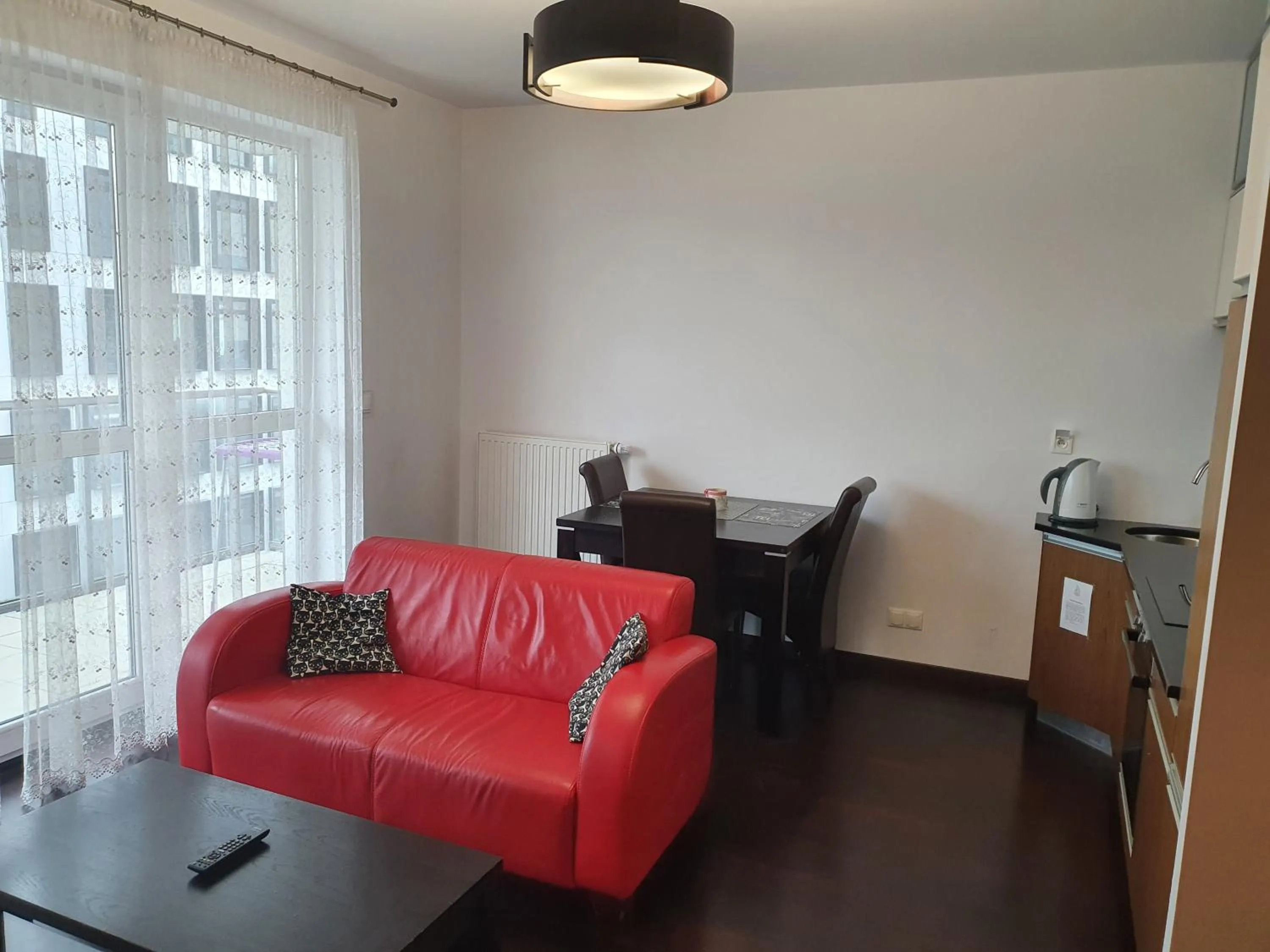 Kitchen or kitchenette, Seating Area in NotaBene Wola Apartment