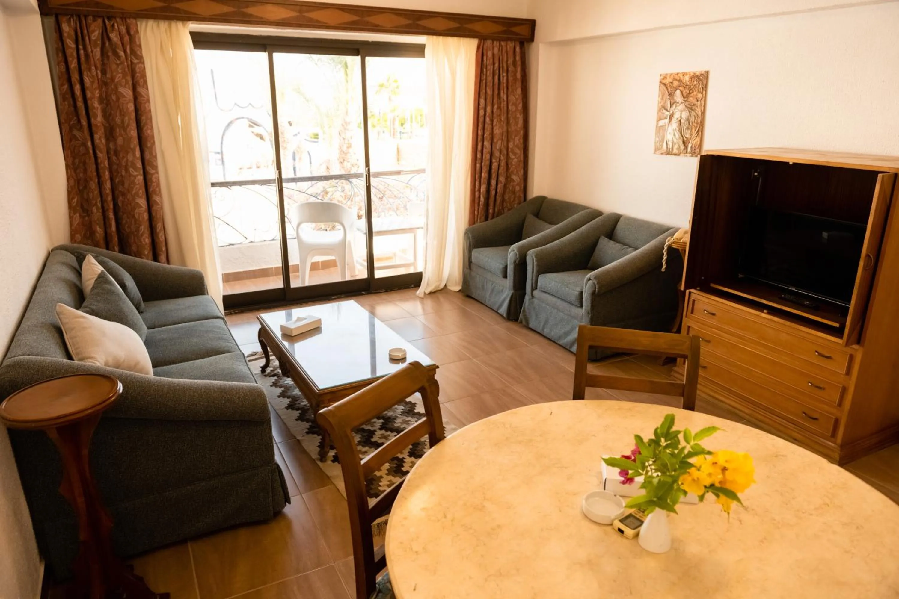 Communal lounge/ TV room in Turquoise Beach Hotel