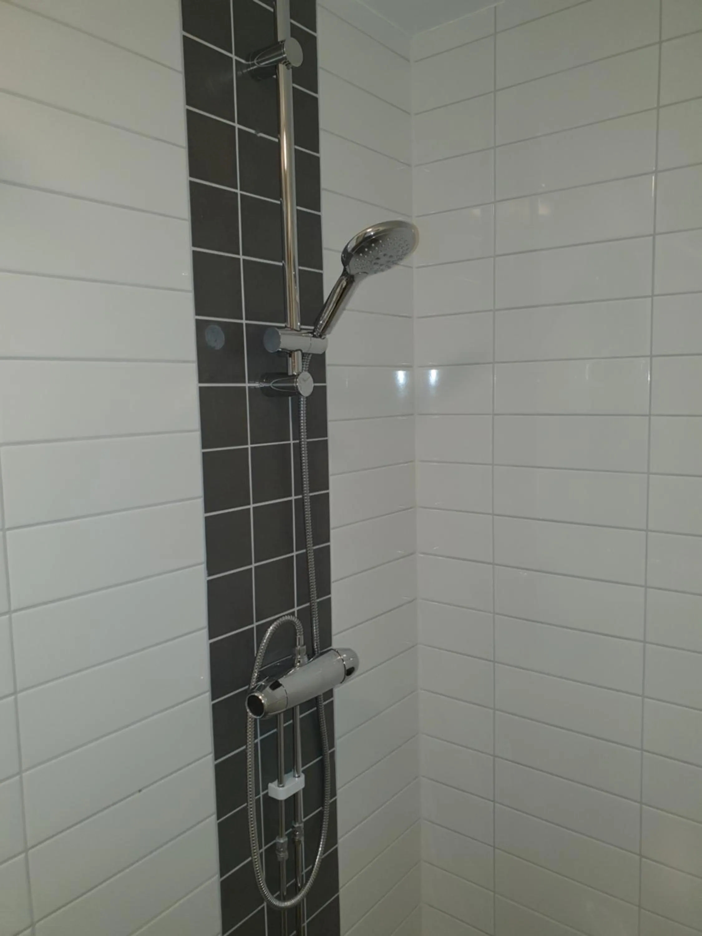 Shower in Ariston Hotell