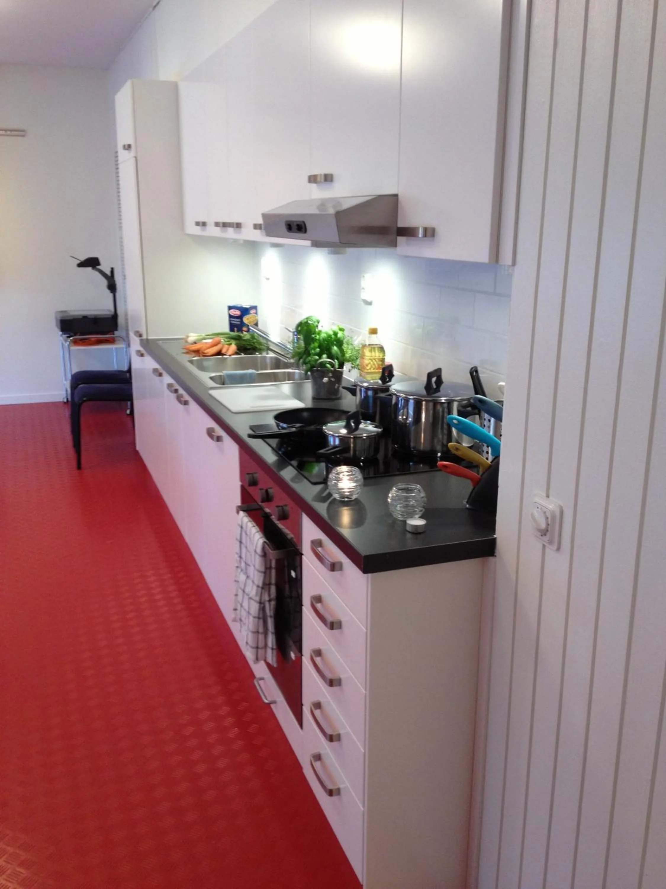 Kitchen or kitchenette in Ariston Hotell
