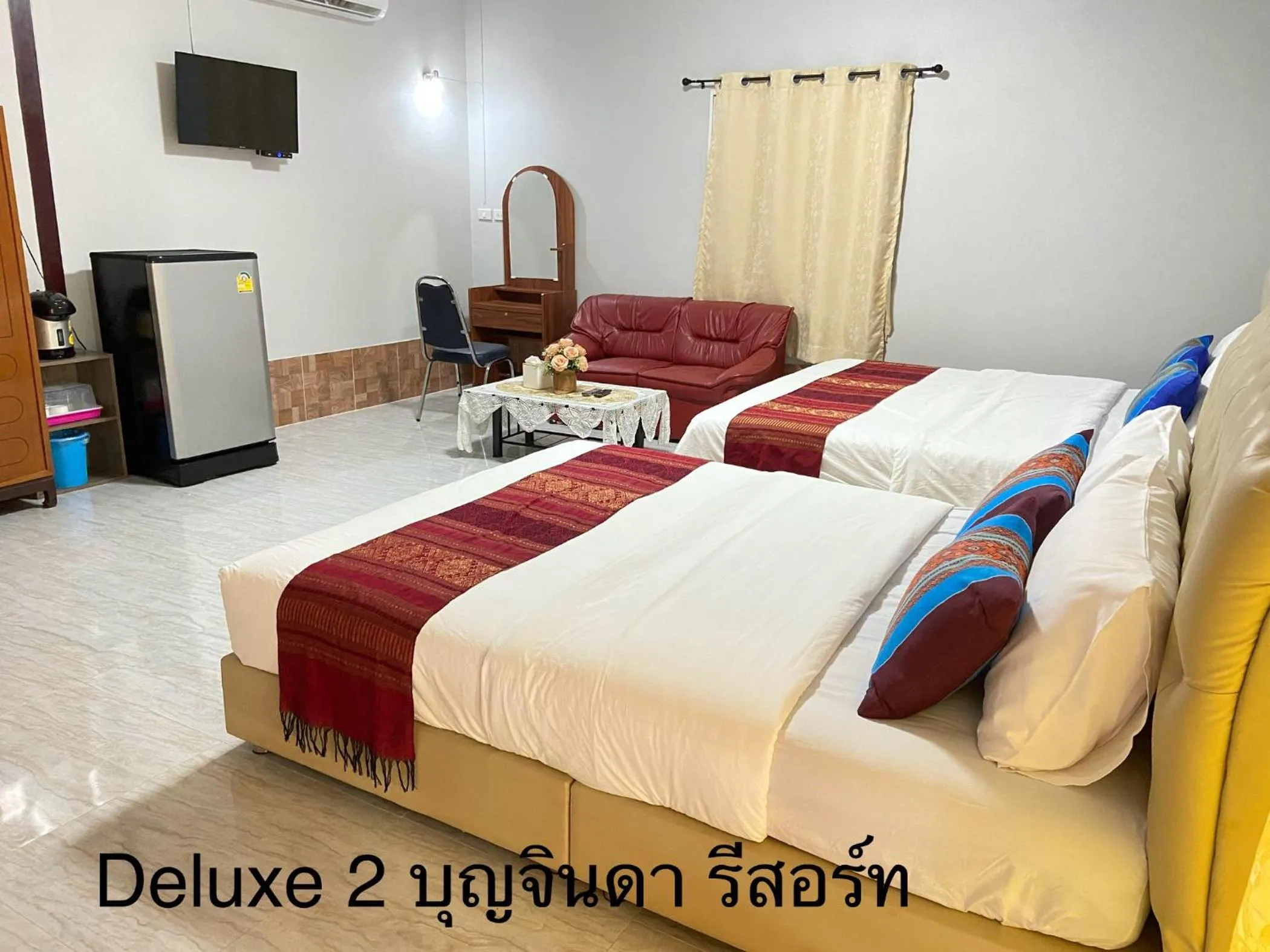 Bed in บุญจินดา รีสอร์ท