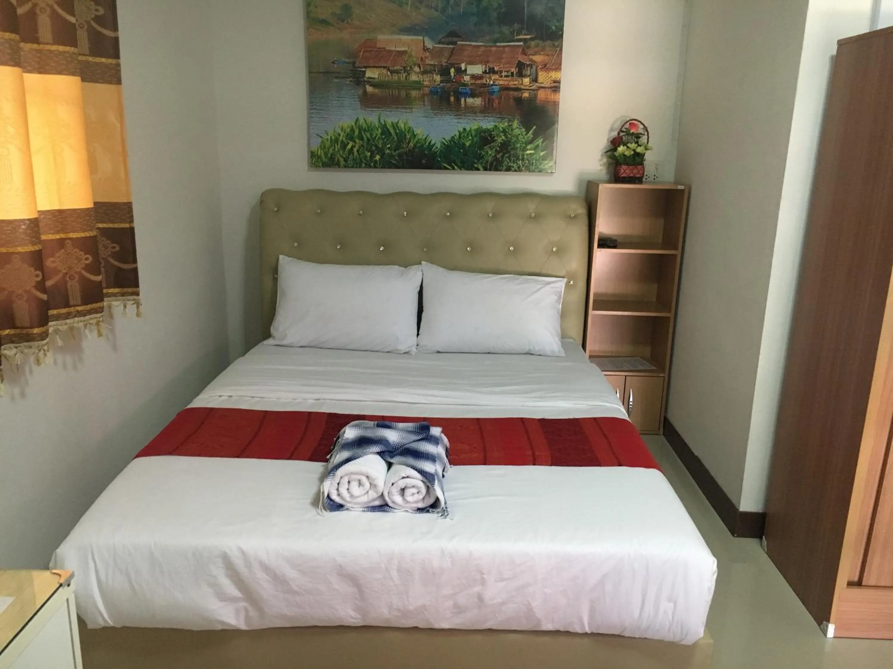 Bed in บุญจินดา รีสอร์ท