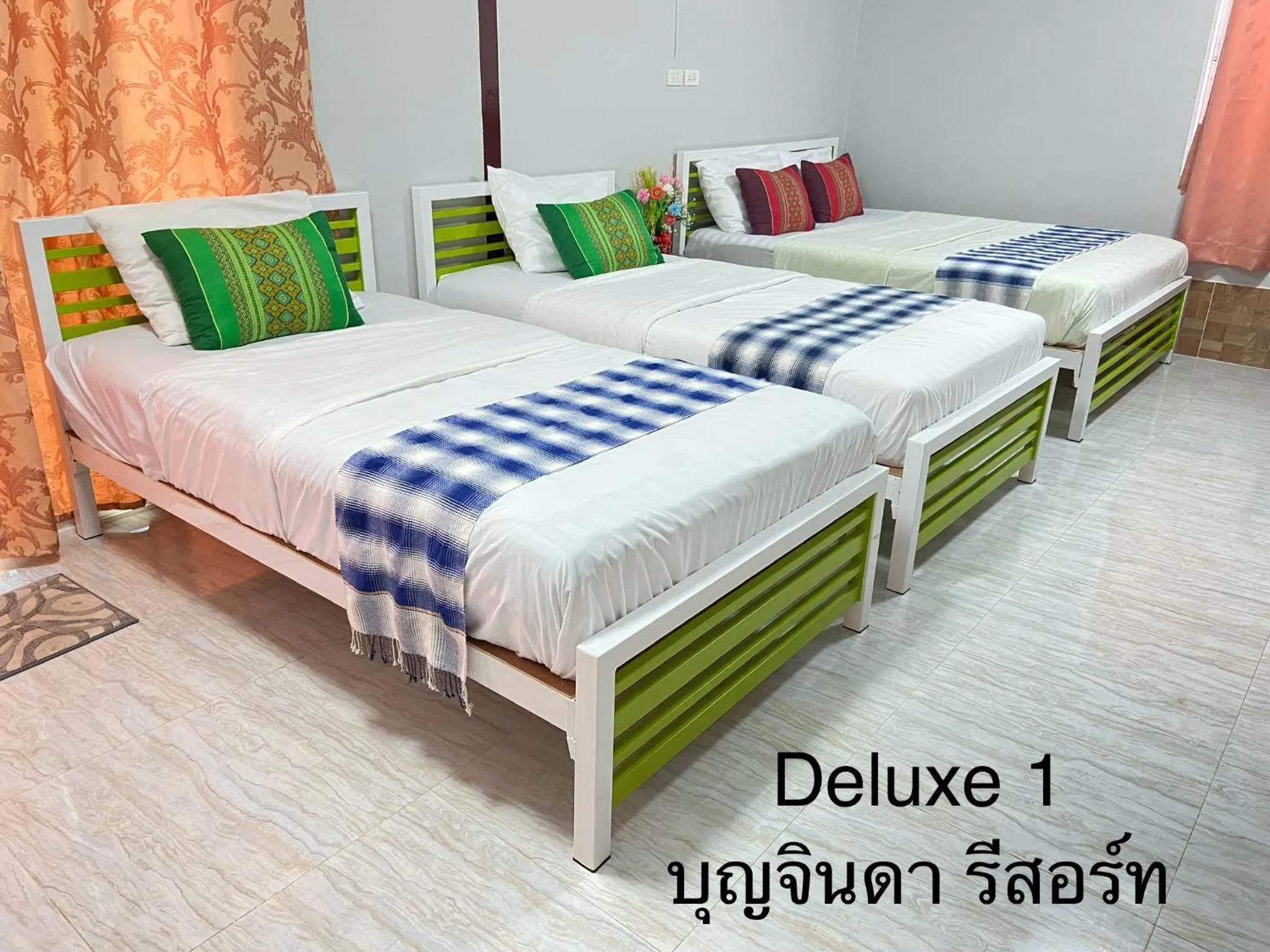 Bed in บุญจินดา รีสอร์ท