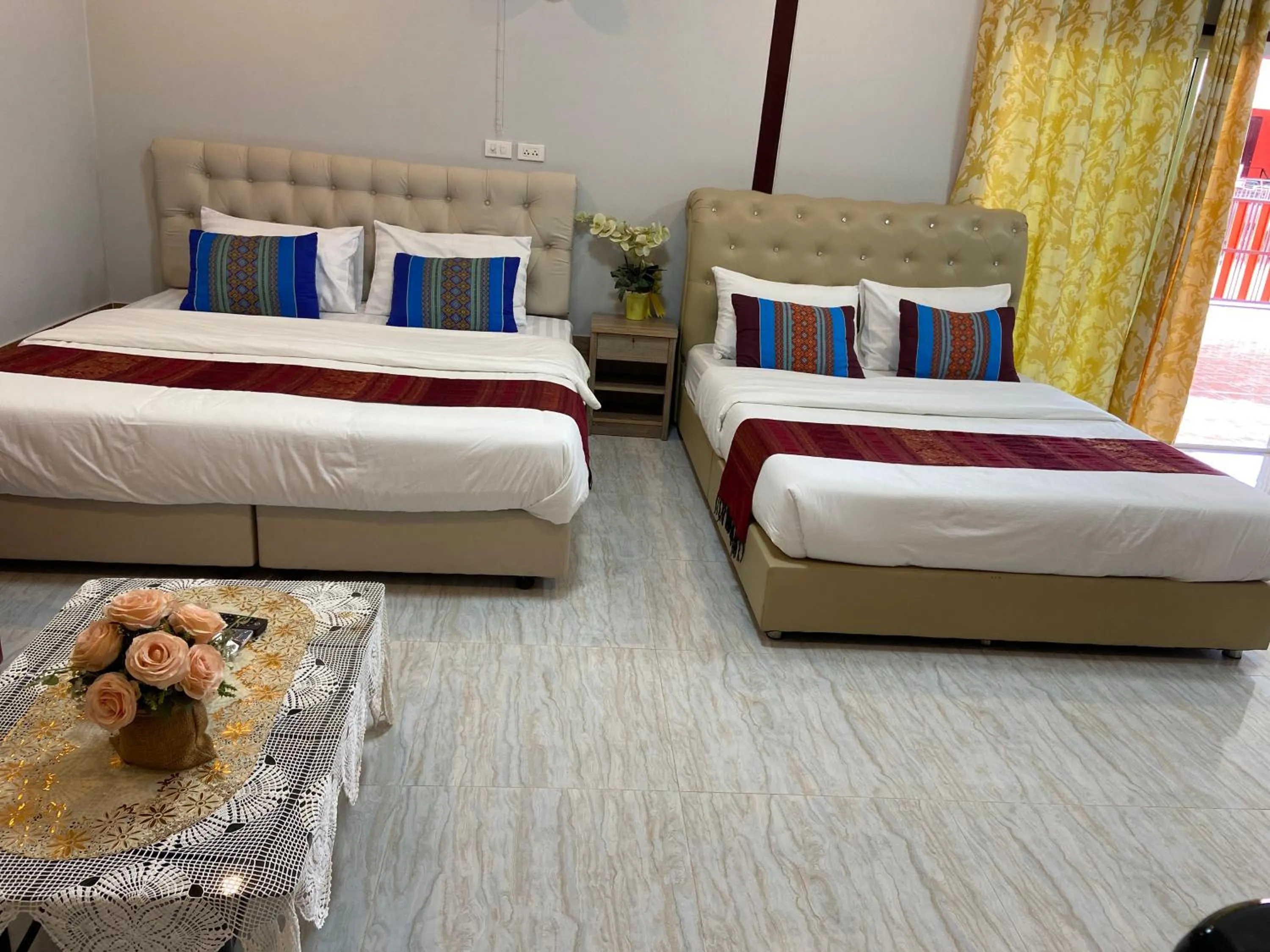 Bed in บุญจินดา รีสอร์ท