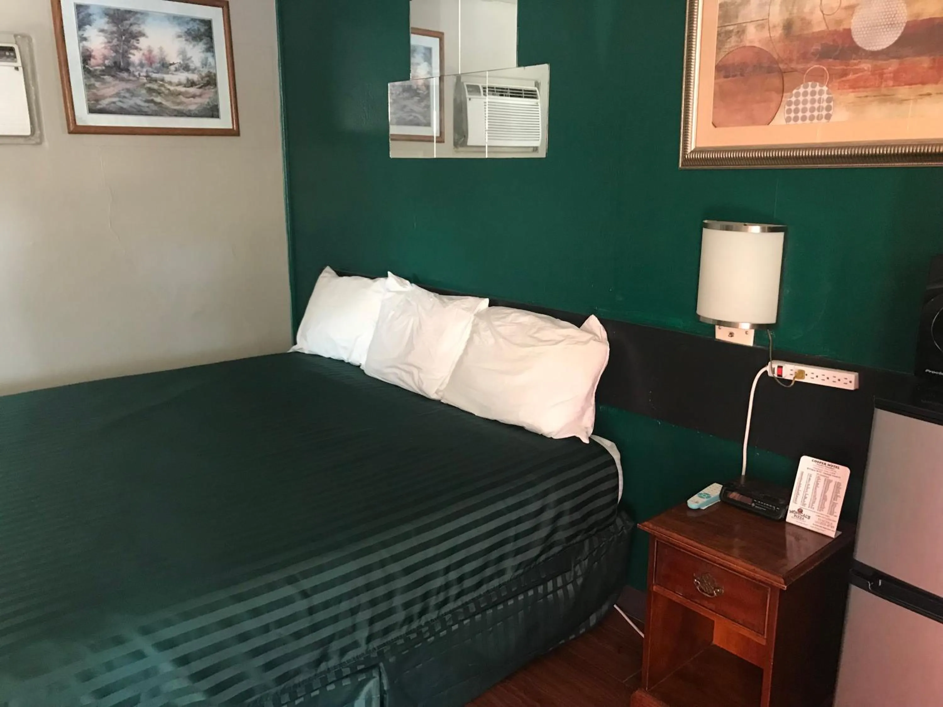 Bed in Cooper Motel Tuscola