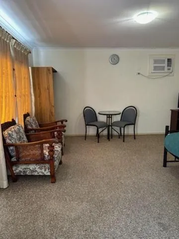 Seating area in Camellia Motel
