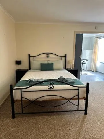 Bed in Camellia Motel