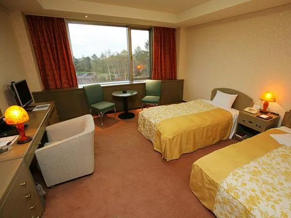 Photo of the whole room, Bed in Izumigo Kiyosato Kogen Hotel