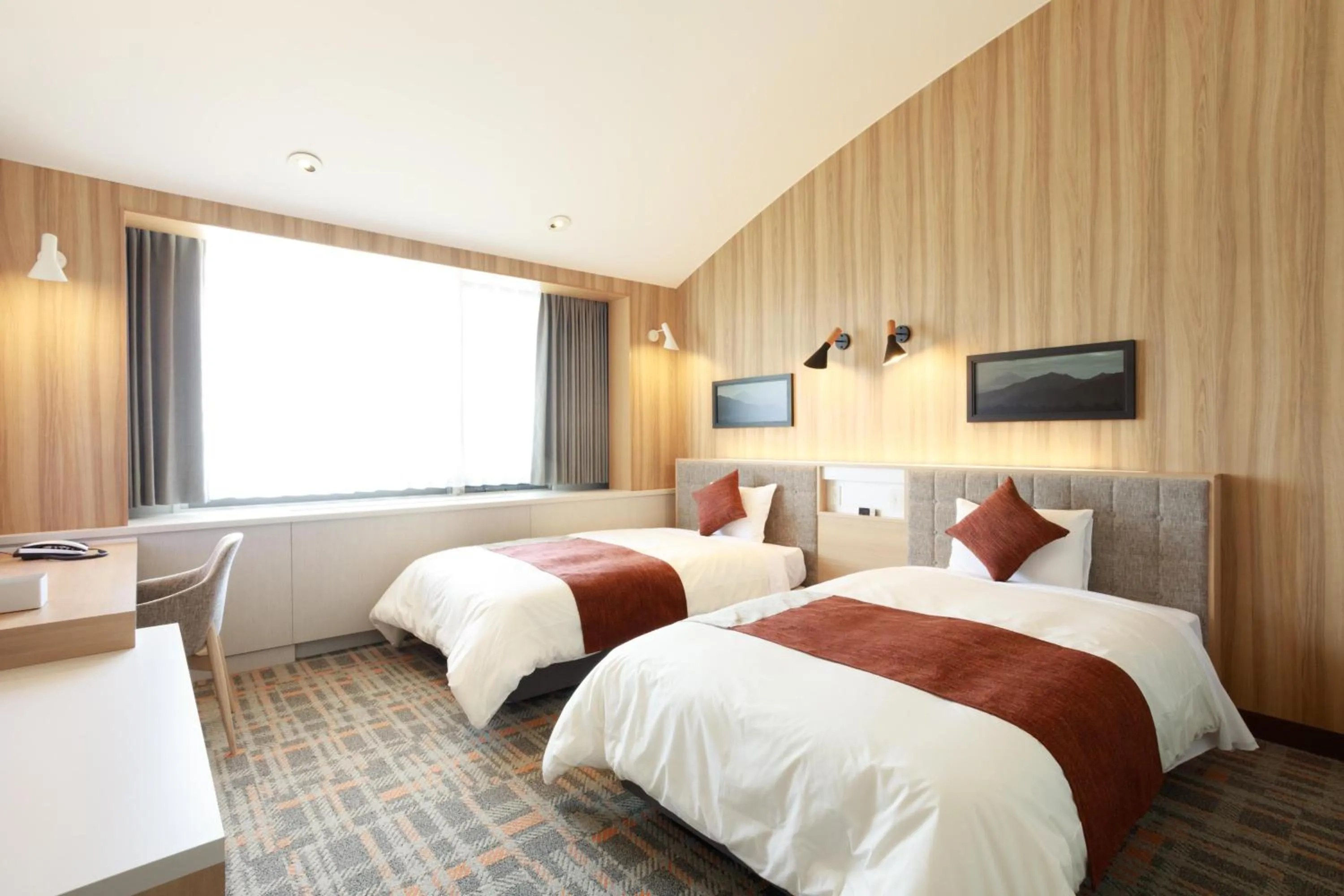 Bed in Izumigo Kiyosato Kogen Hotel