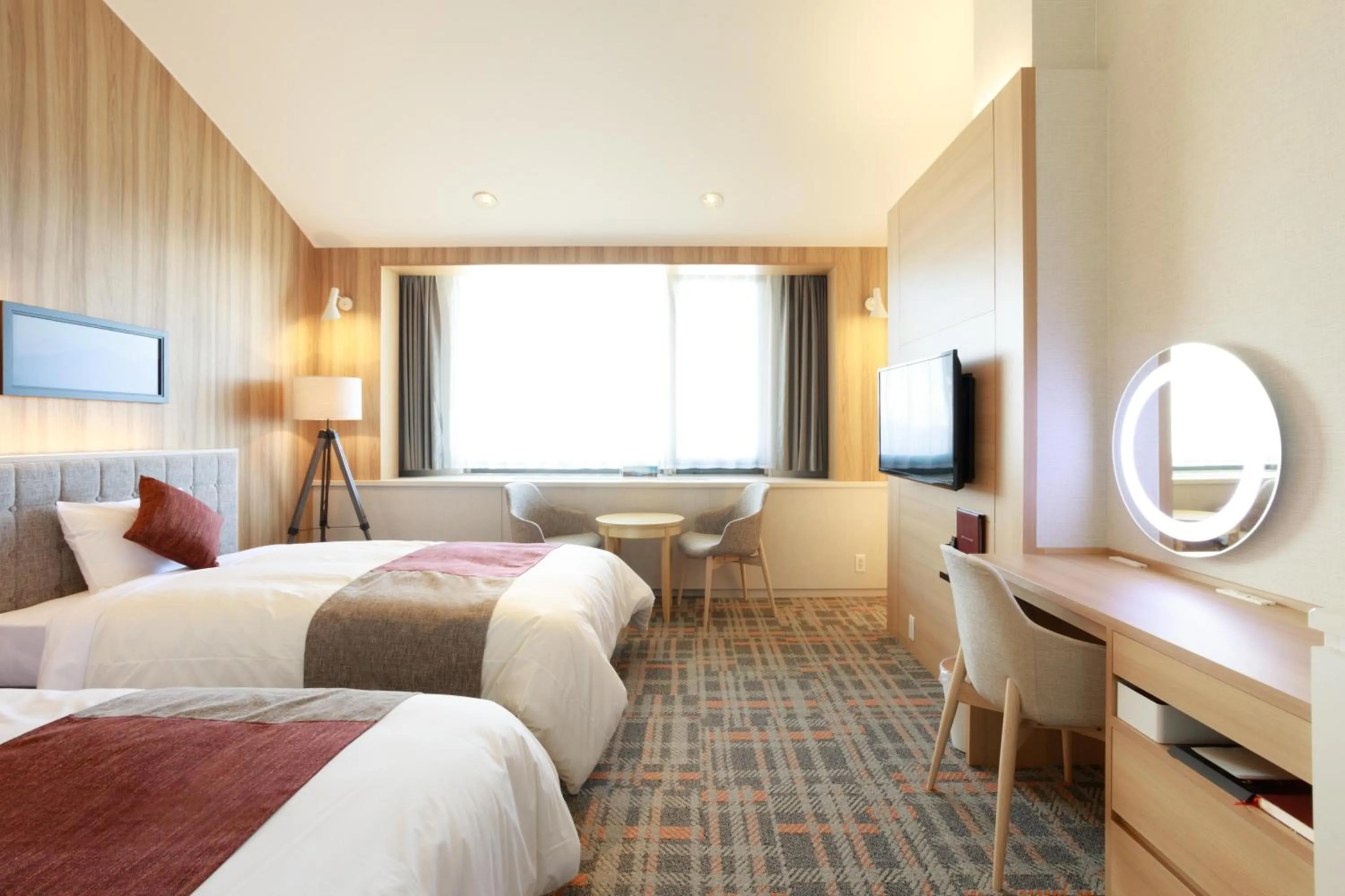 Bed in Izumigo Kiyosato Kogen Hotel