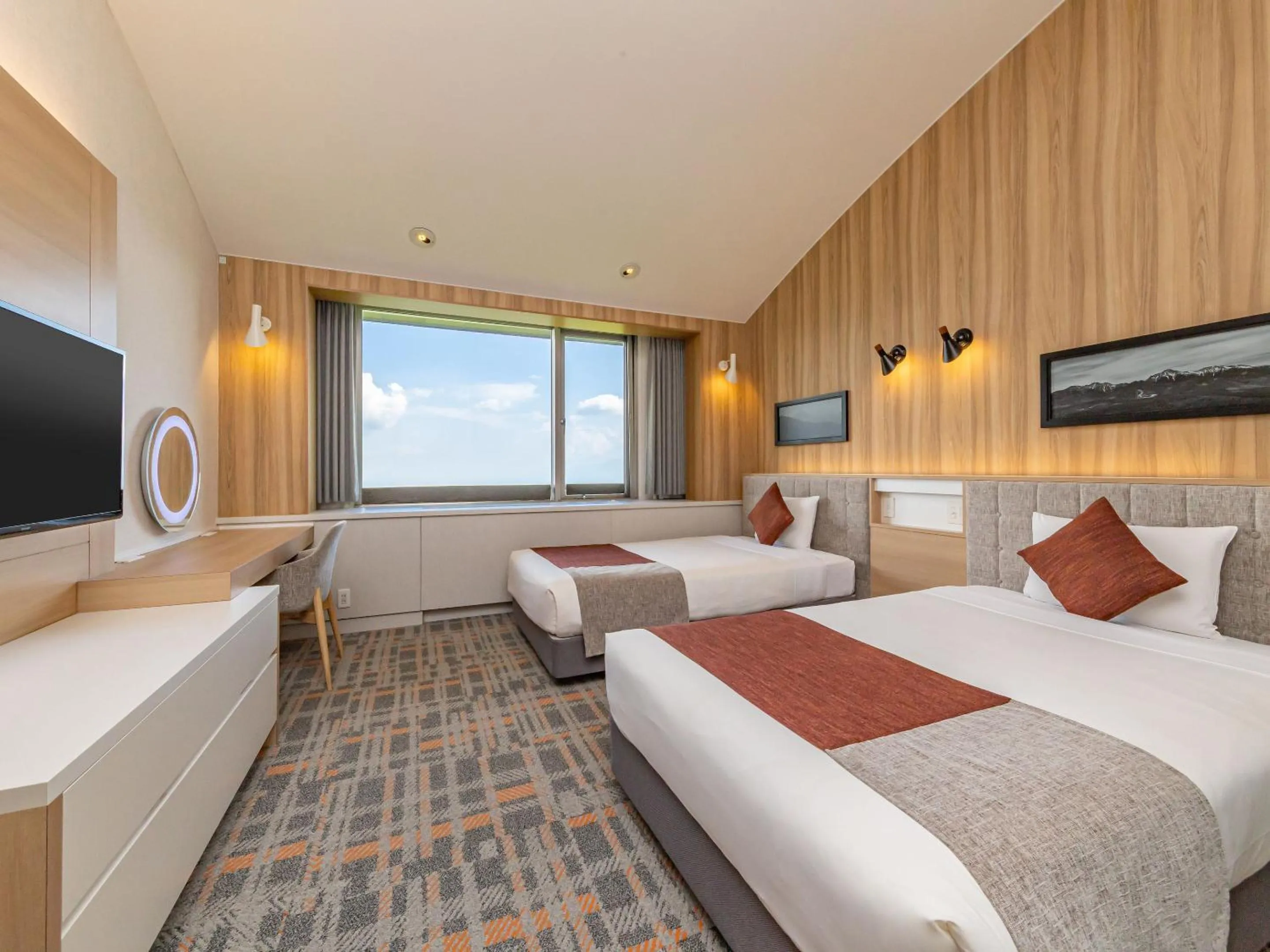 Bed in Izumigo Kiyosato Kogen Hotel