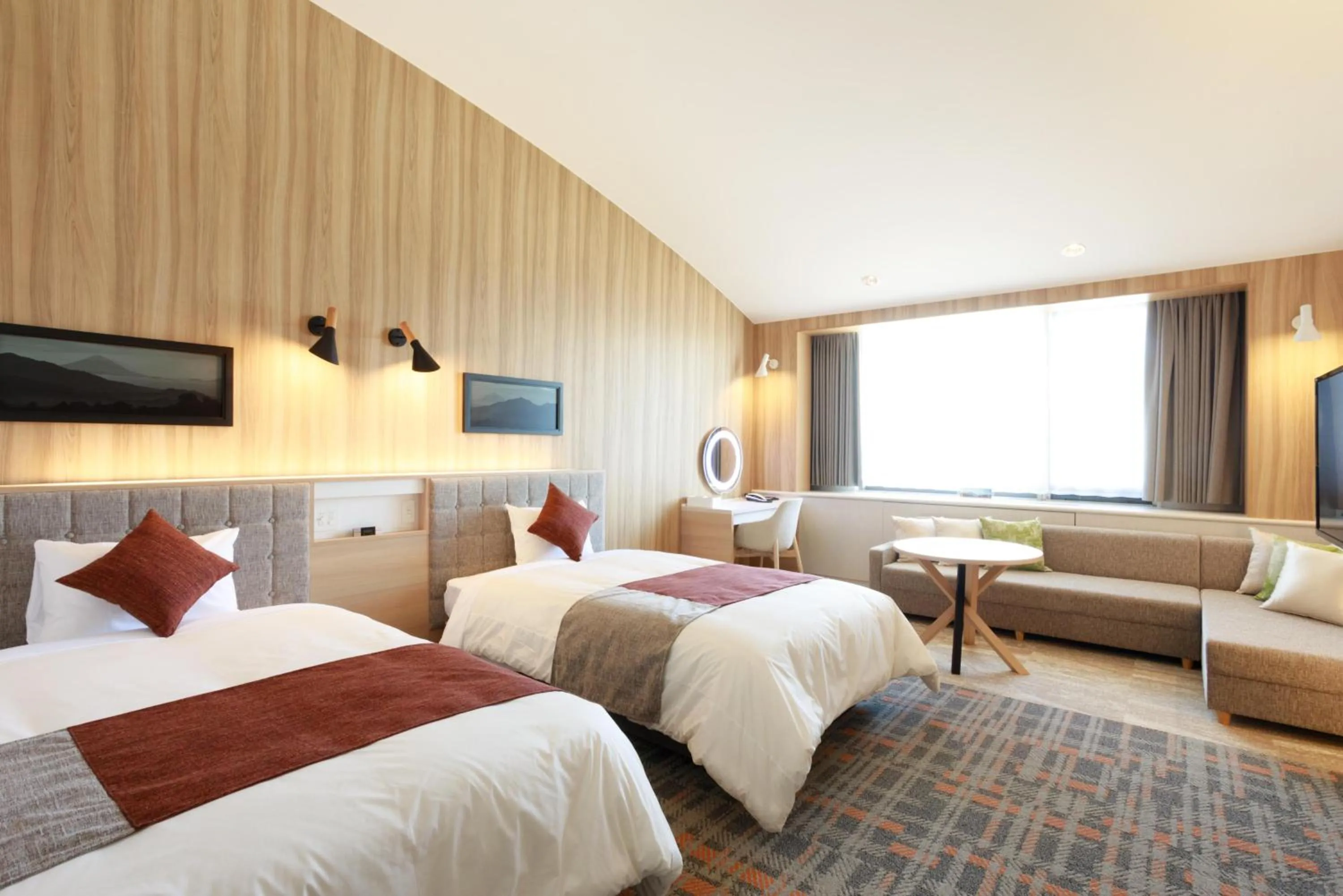 Bed in Izumigo Kiyosato Kogen Hotel