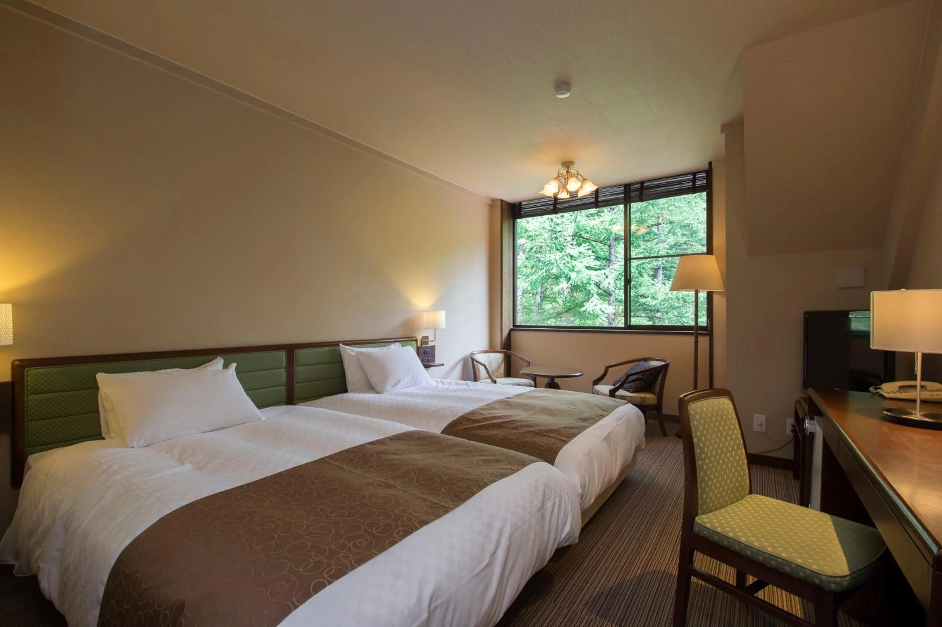 Photo of the whole room, Bed in Takayama Wan Wan Paradise Hotel & Cottage