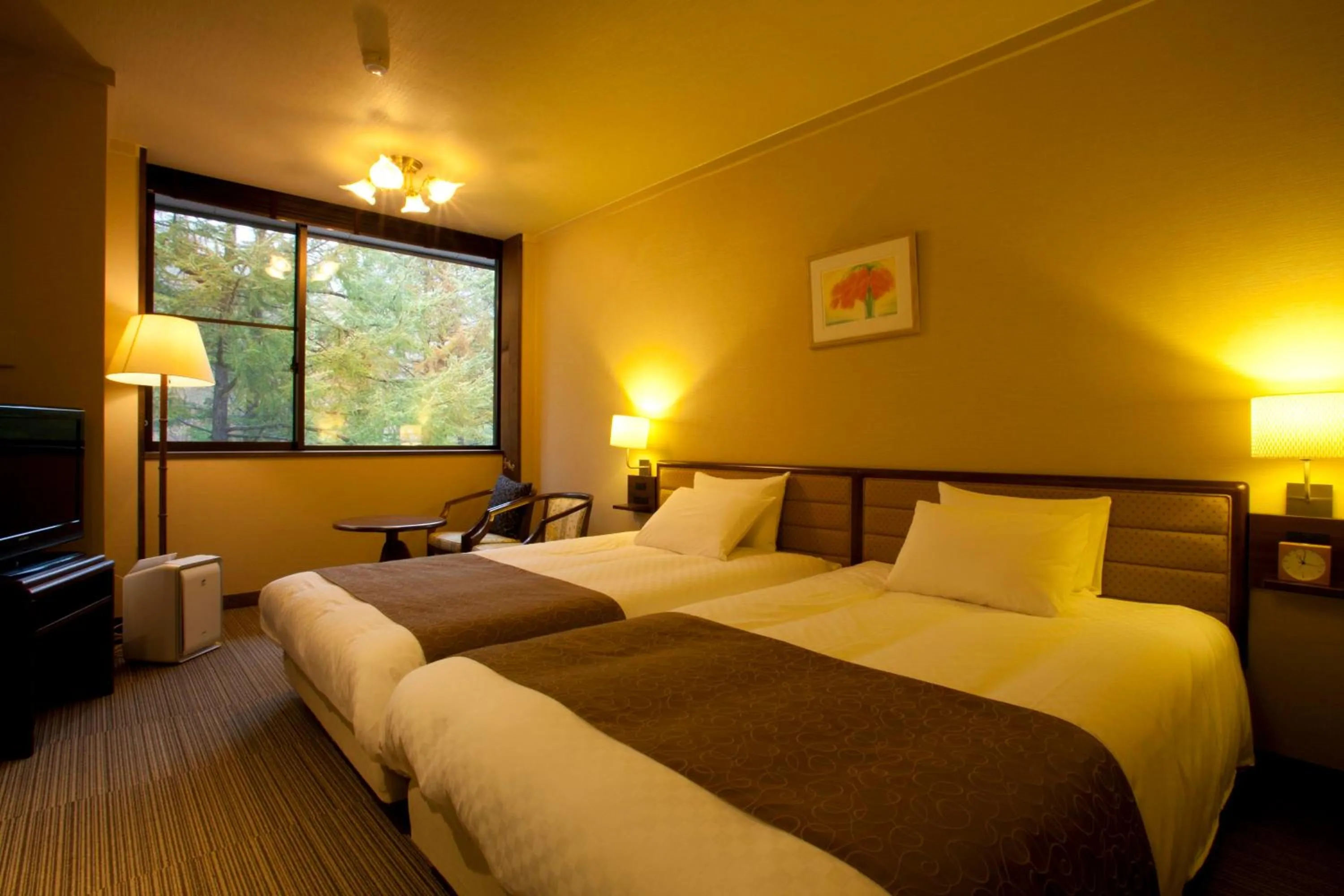 Photo of the whole room, Bed in Takayama Wan Wan Paradise Hotel & Cottage