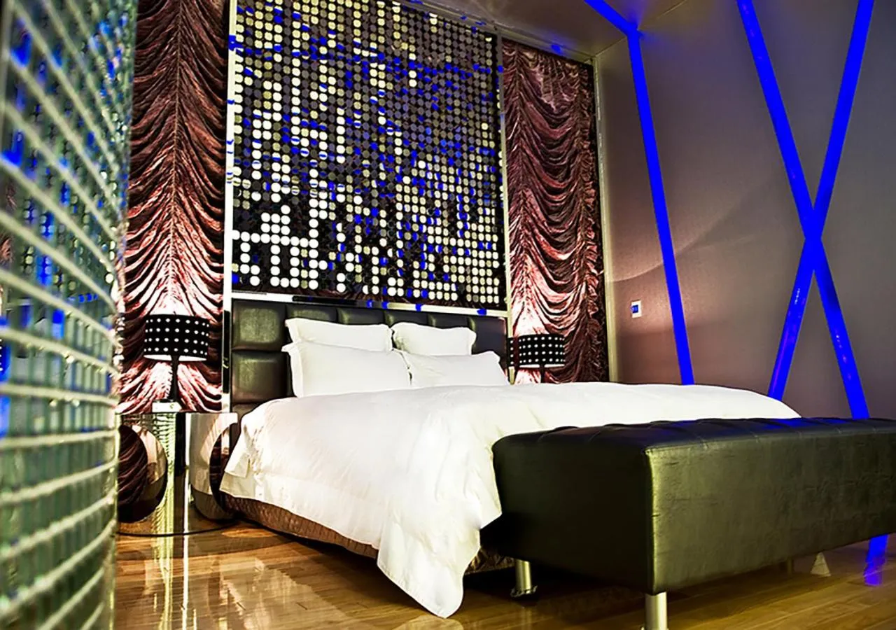 Bed in Royal Group Motel Ming Zu Branch