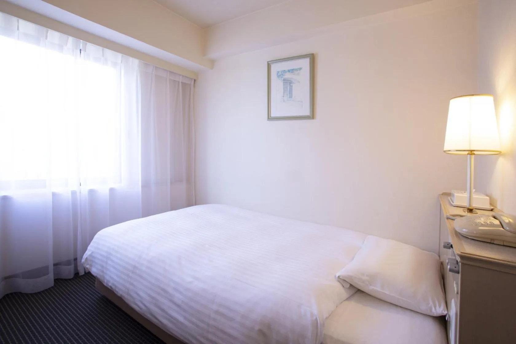 Photo of the whole room, Bed in Shimane Hamada Washington Hotel Plaza