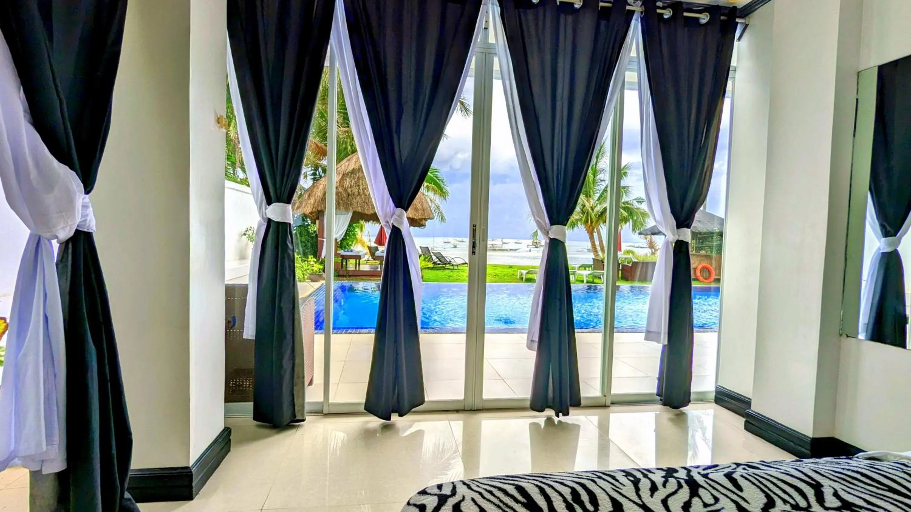 Bed in Bohol South Beach Hotel