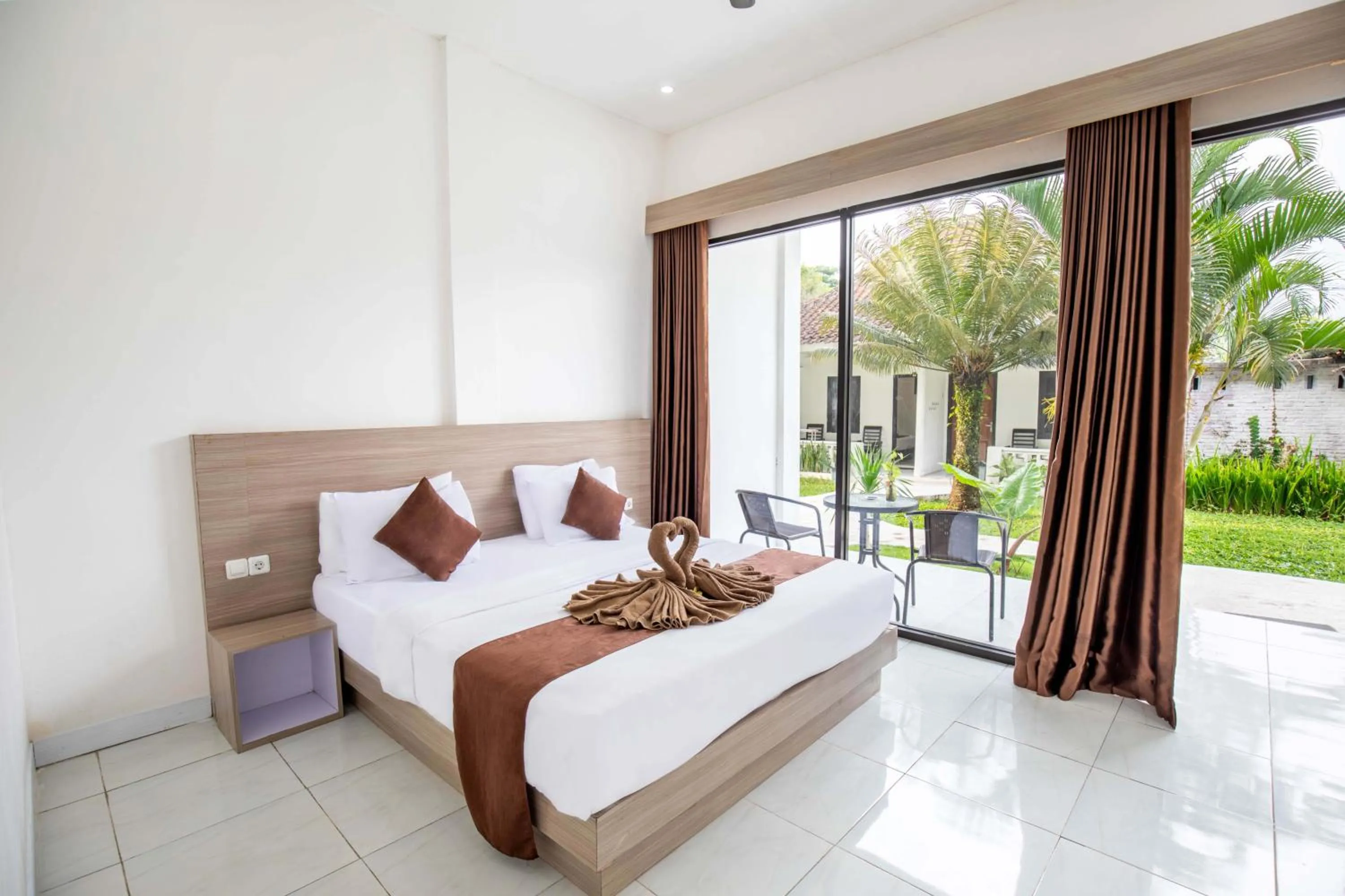 Bed in Pondok Tetebatu Cottages and Cafe