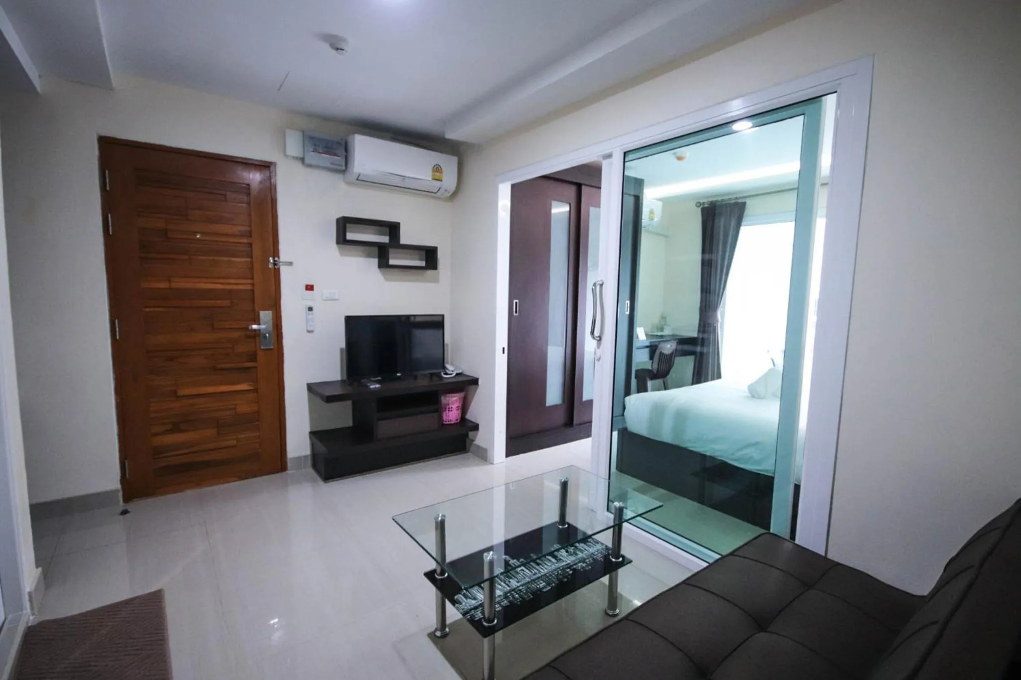 Communal lounge/ TV room in The Cosy River