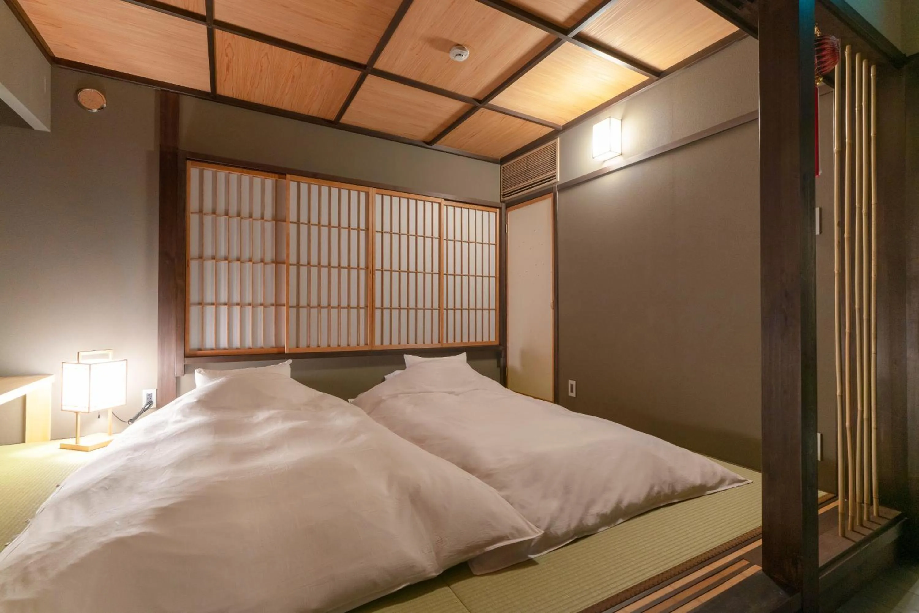 Bedroom, Bed in Ainotsuji Machiya House