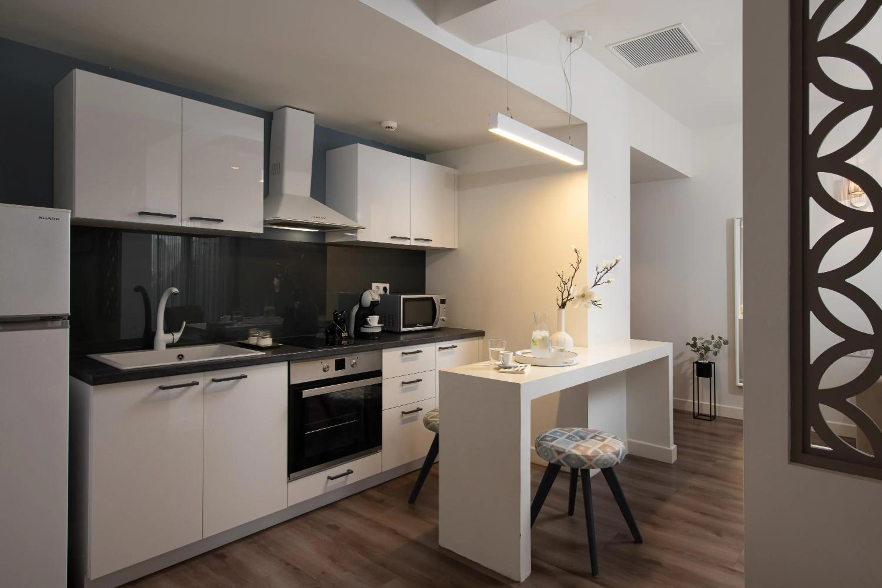 Kitchen or kitchenette in Urban Nest - Suites & Apartments