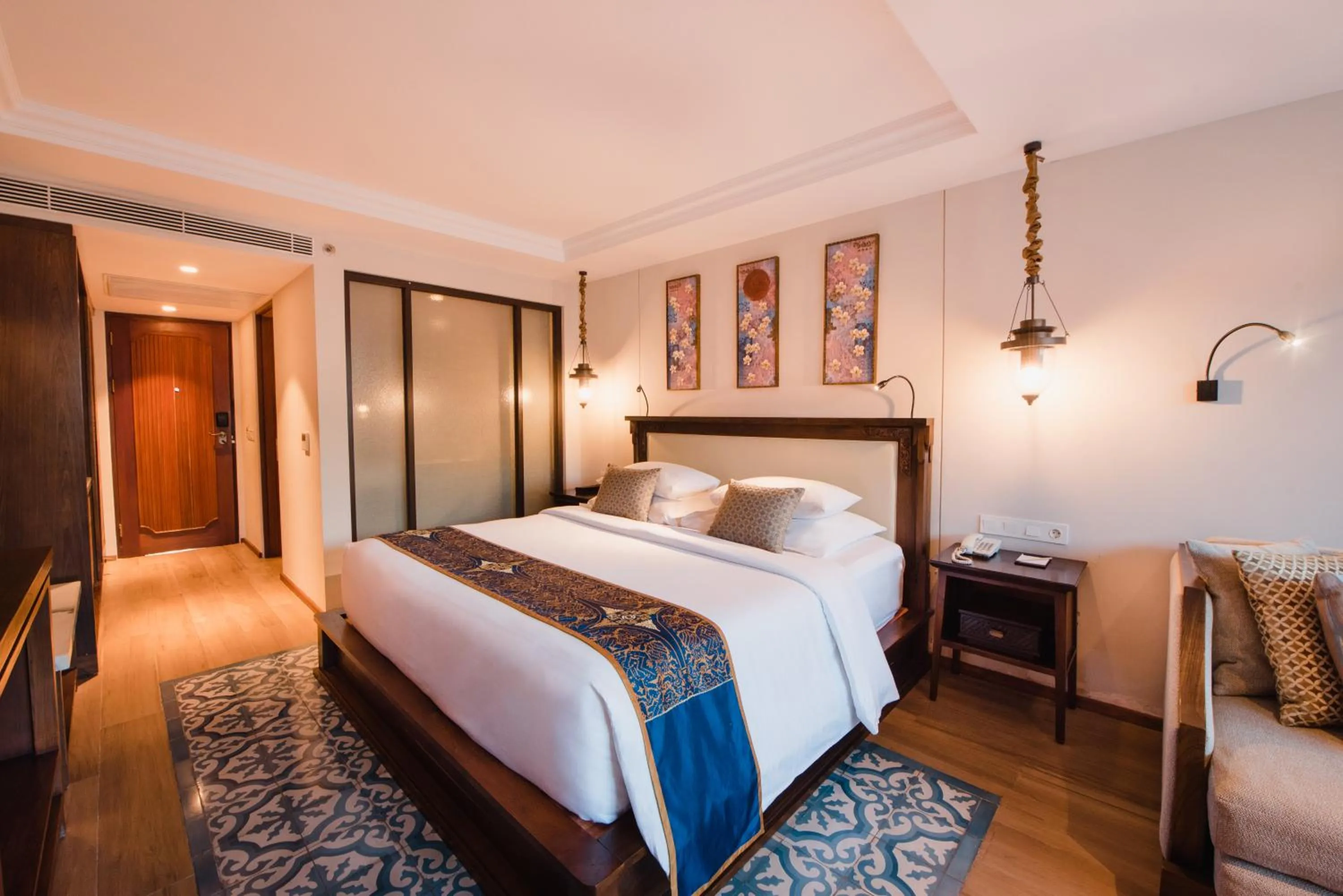 Bed in Ramayana Suites and Resort