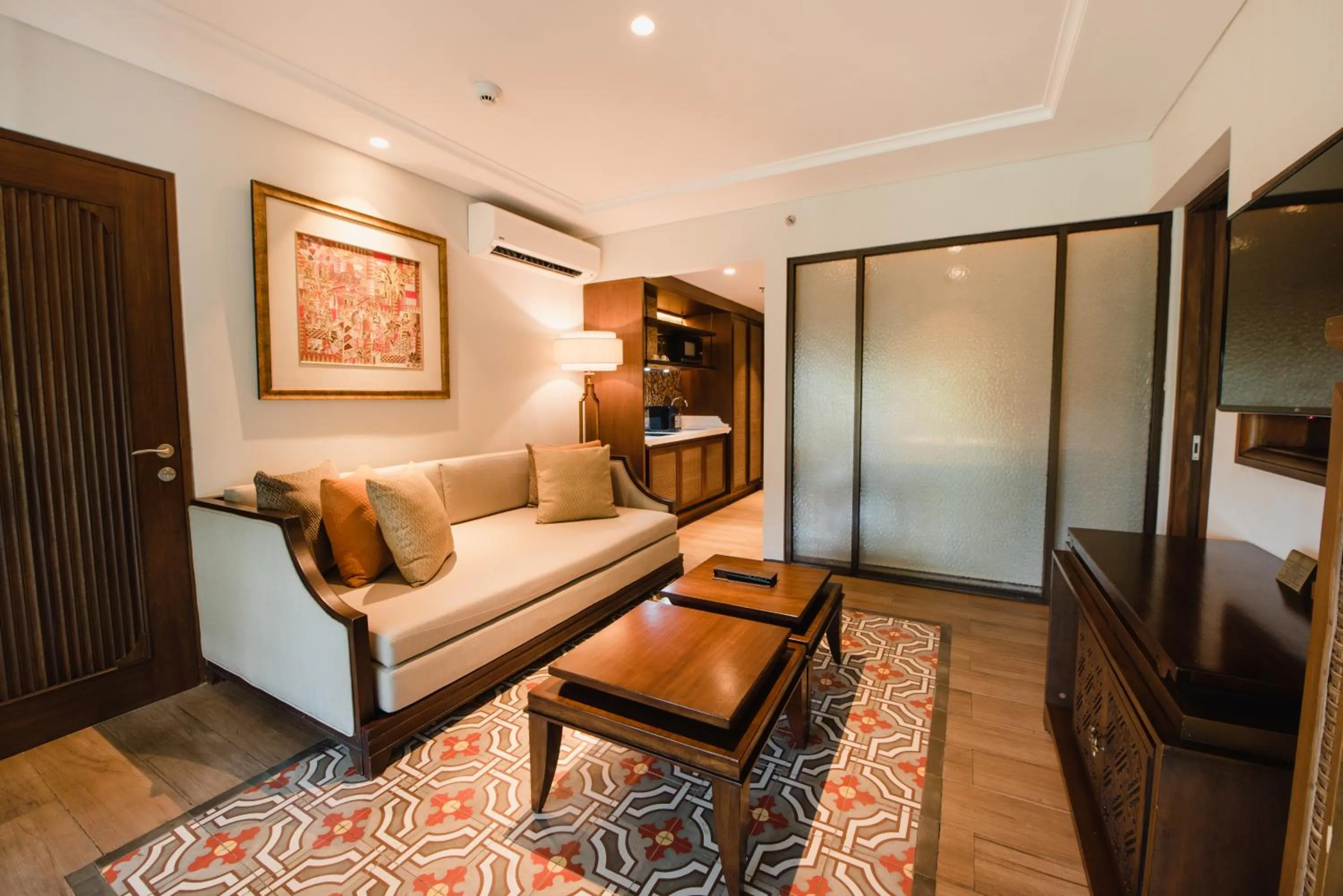 Living room, Bed in Ramayana Suites and Resort