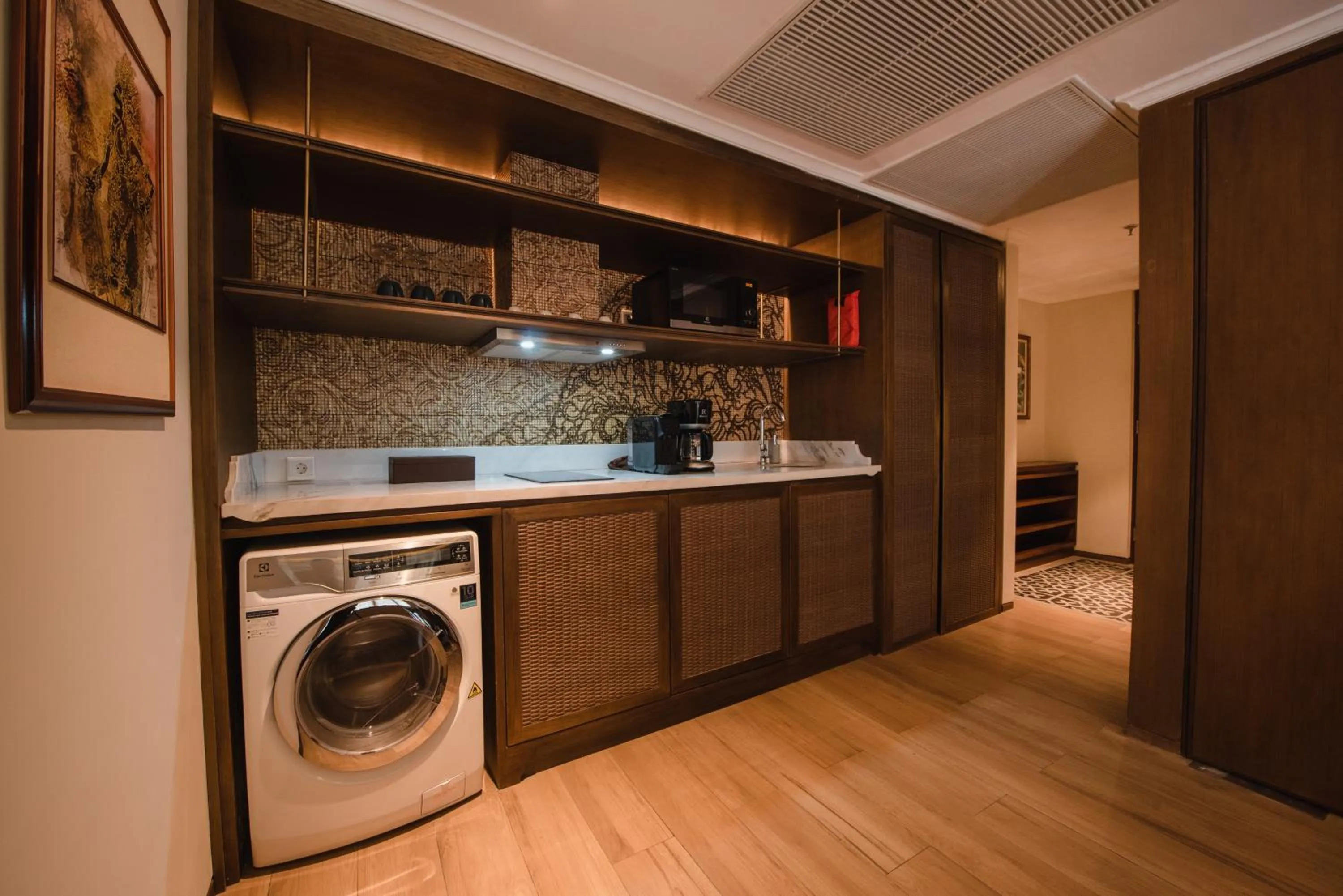 washing machine in Ramayana Suites and Resort