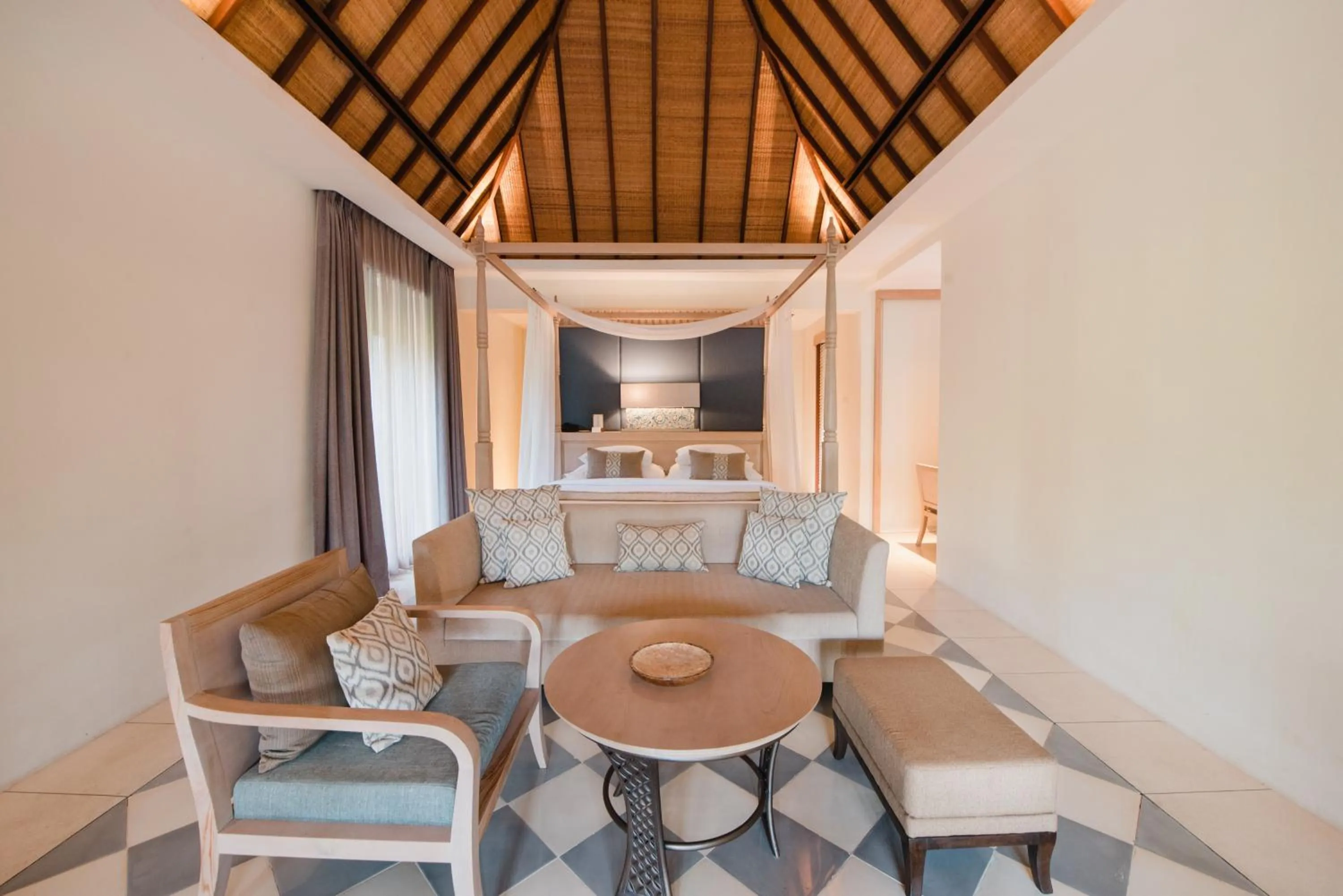 Bed in Ramayana Suites and Resort