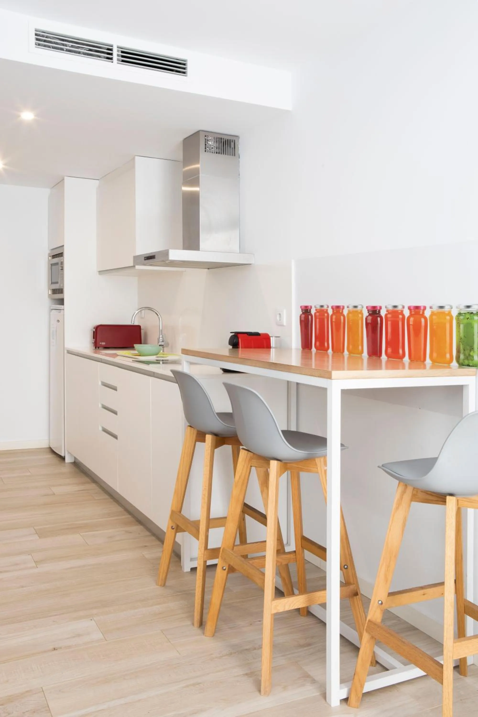 Kitchen or kitchenette in Urban Suites Sitges Apartments by PriorityVillas