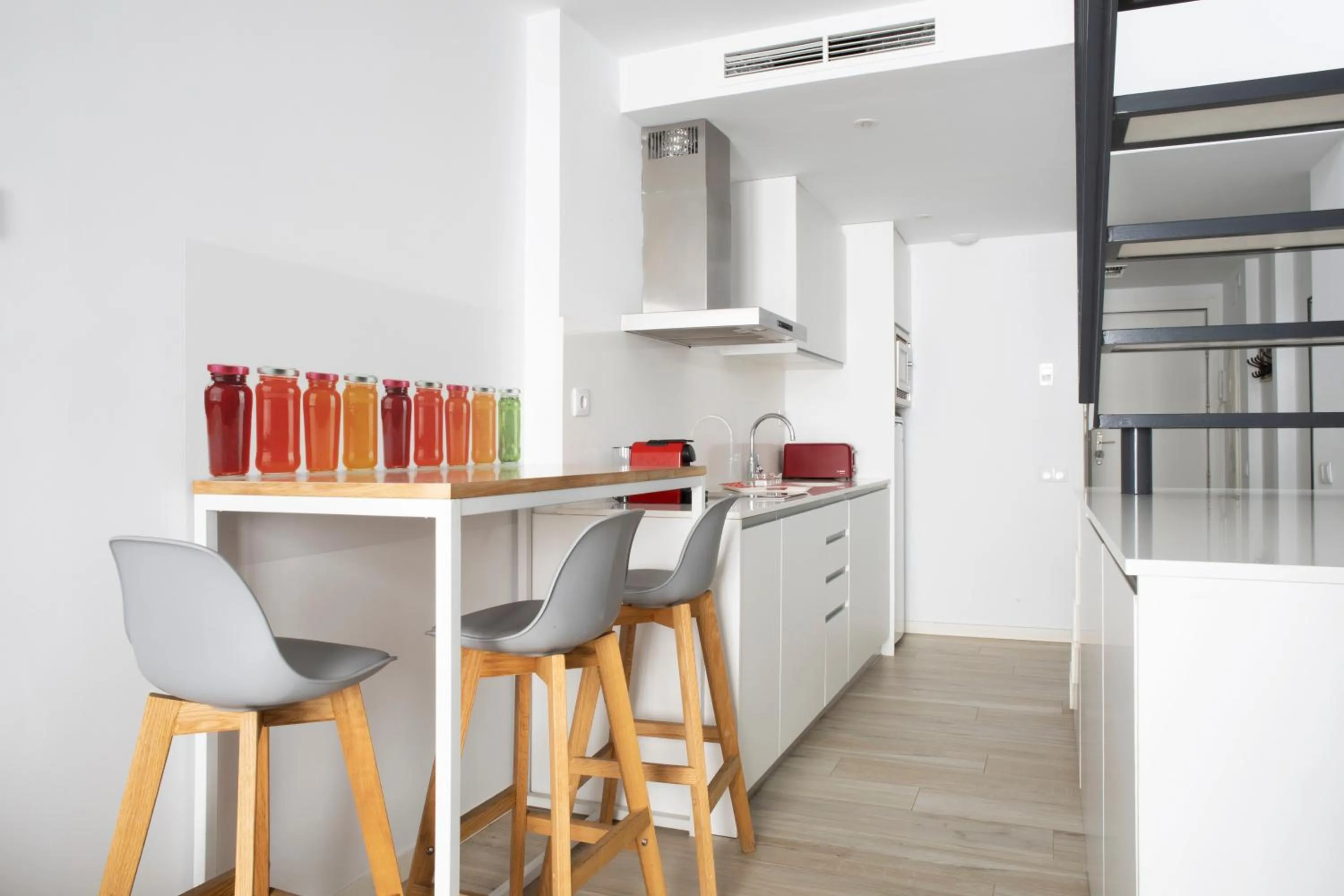 Kitchen or kitchenette in Urban Suites Sitges Apartments by PriorityVillas