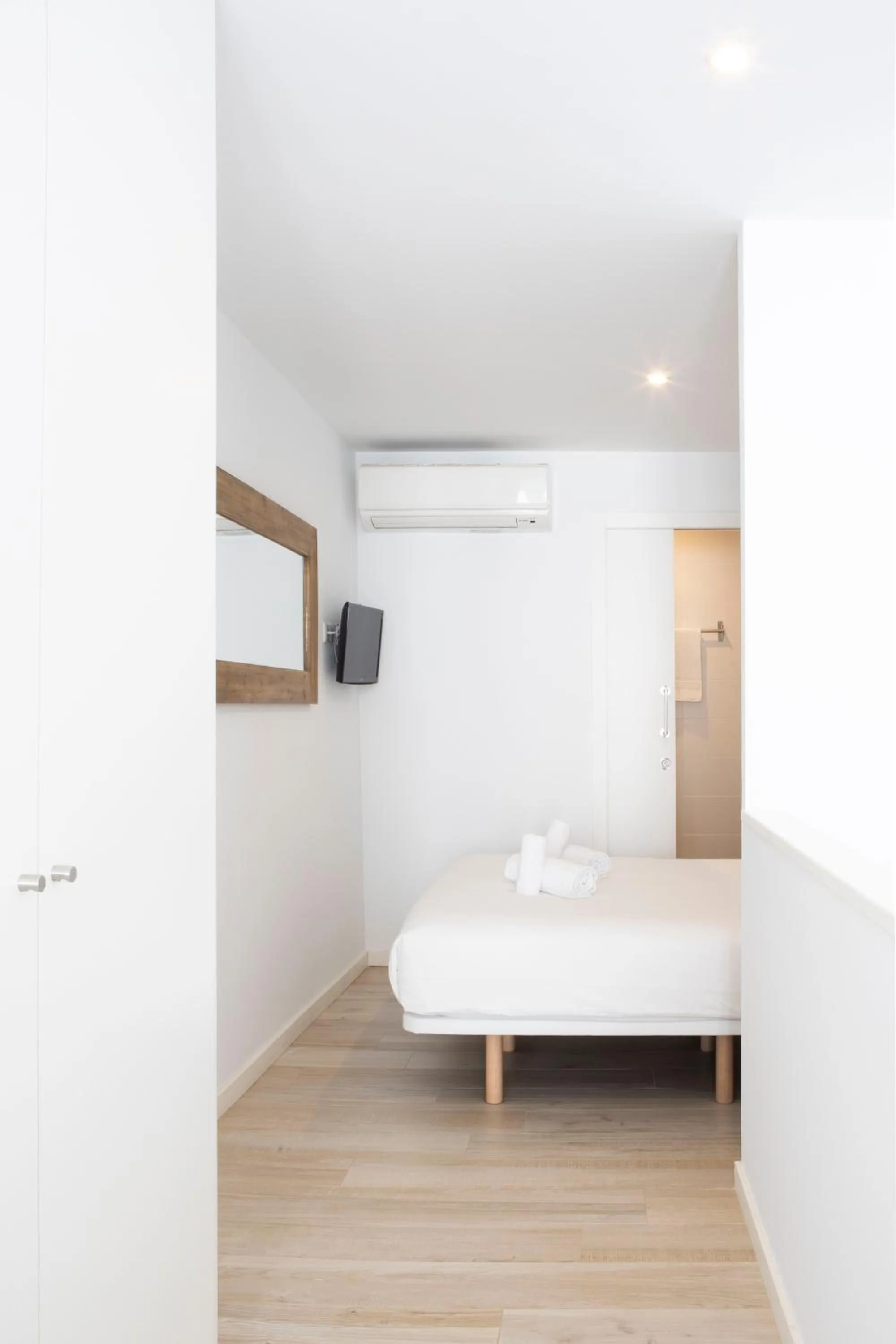 Bed in Urban Suites Sitges Apartments by PriorityVillas