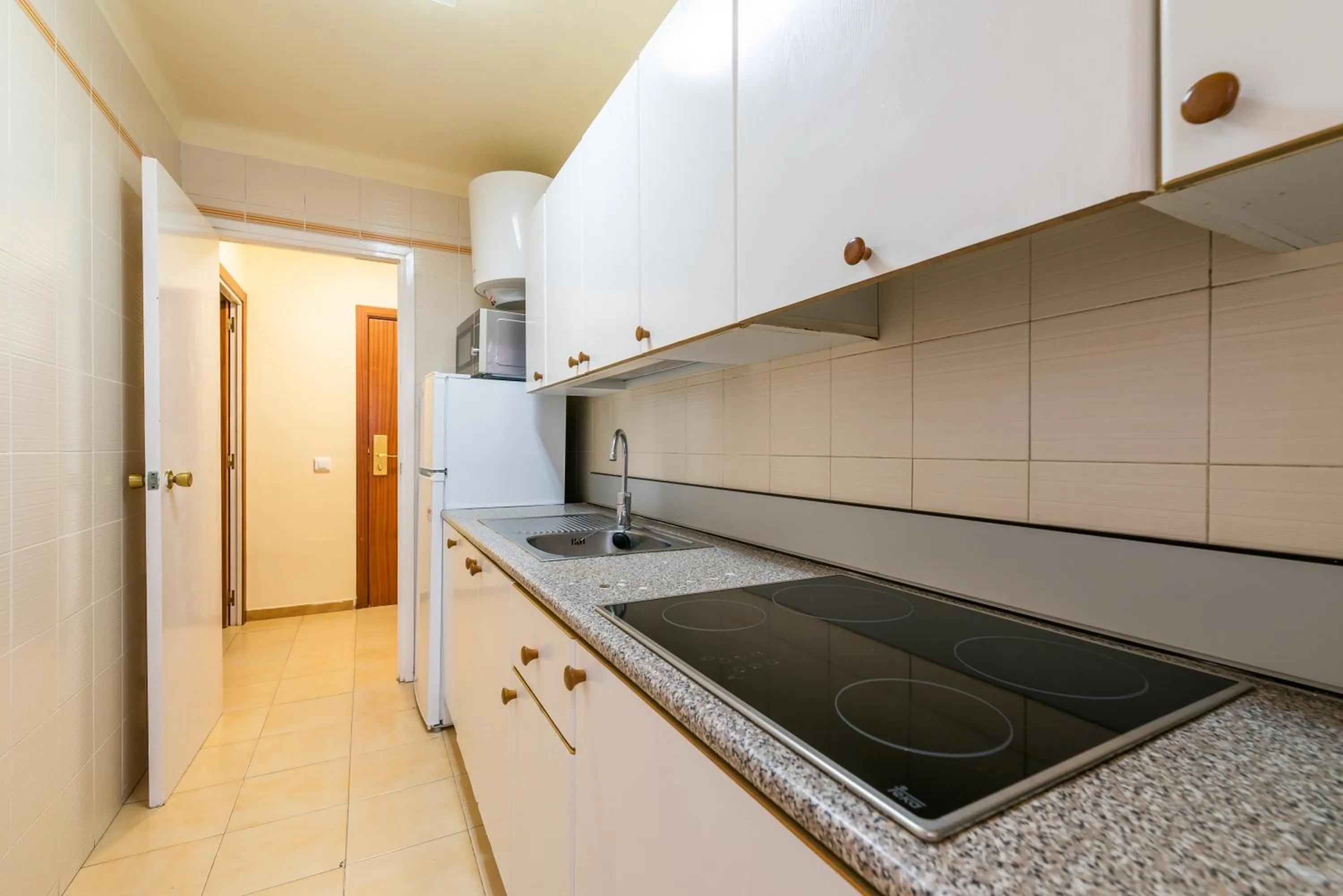 Kitchen or kitchenette in Rentalmar Pins Marina