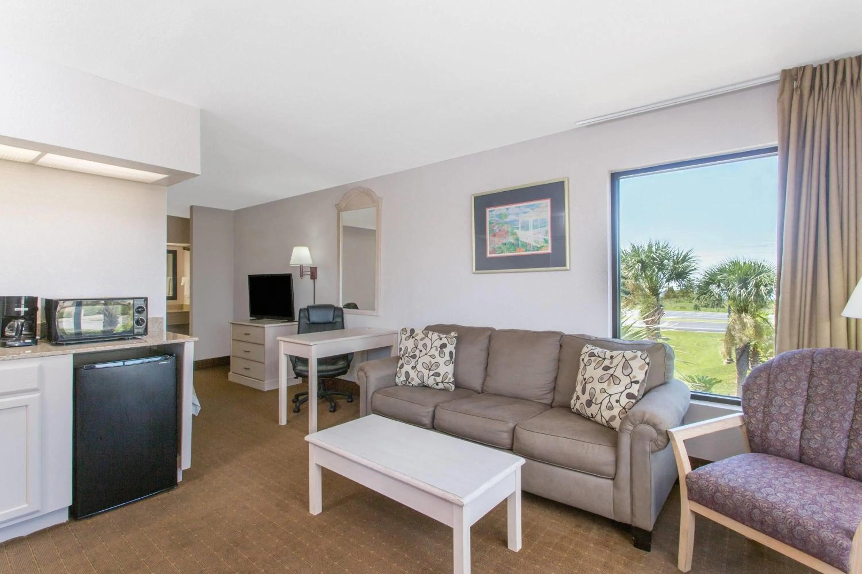 Photo of the whole room in Days Inn & Suites by Wyndham Navarre - near Beaches Hurlburt