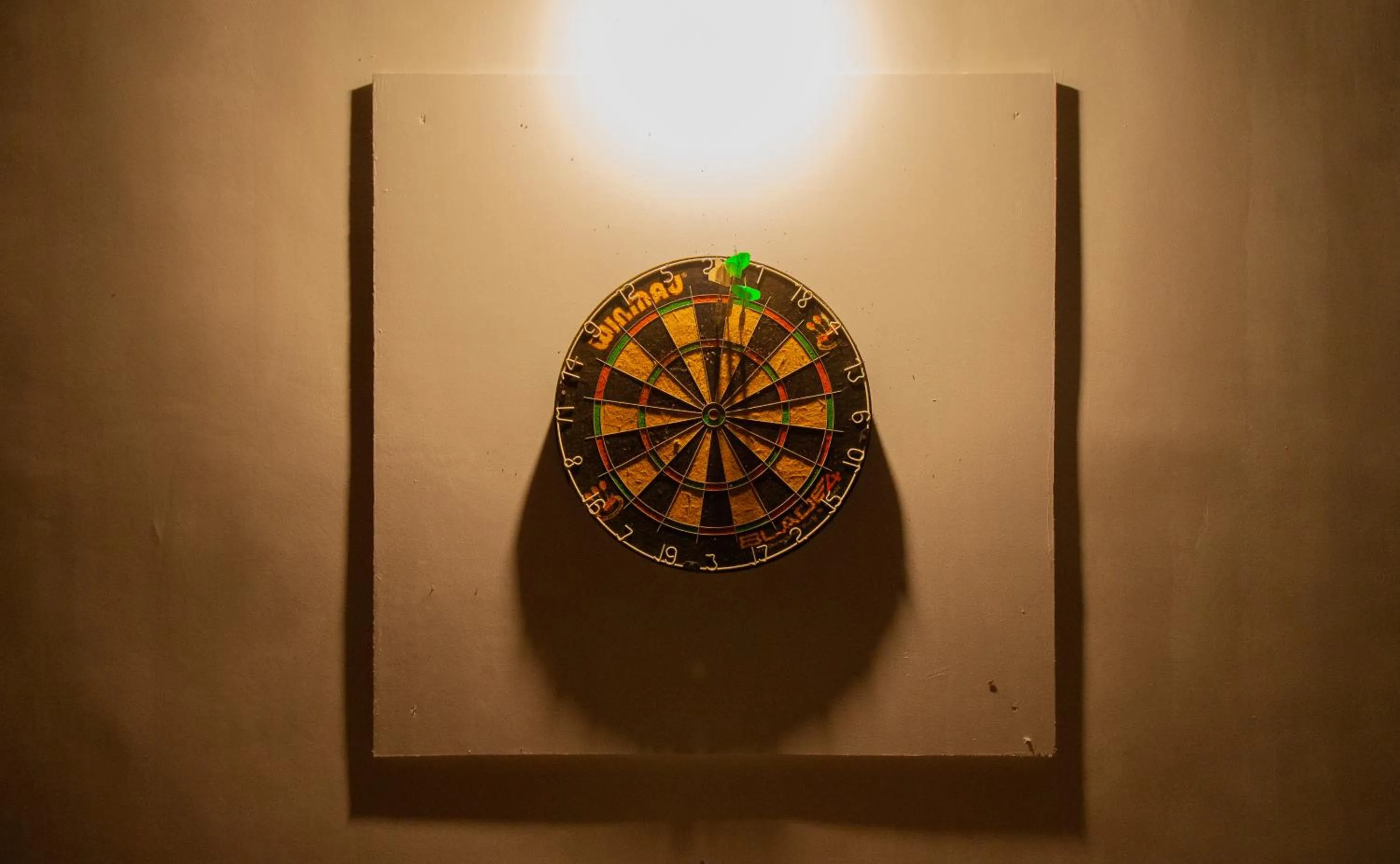 Darts in Sunlit Hostel