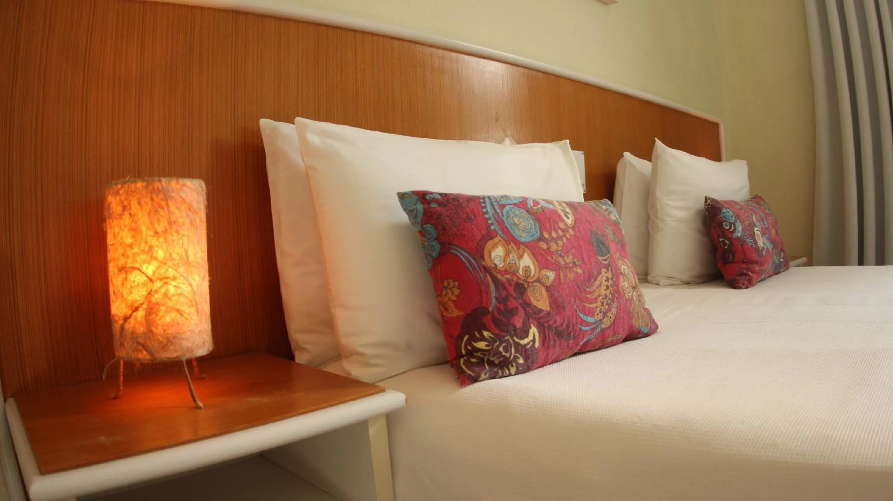 Bed in Atena Praia Hotel