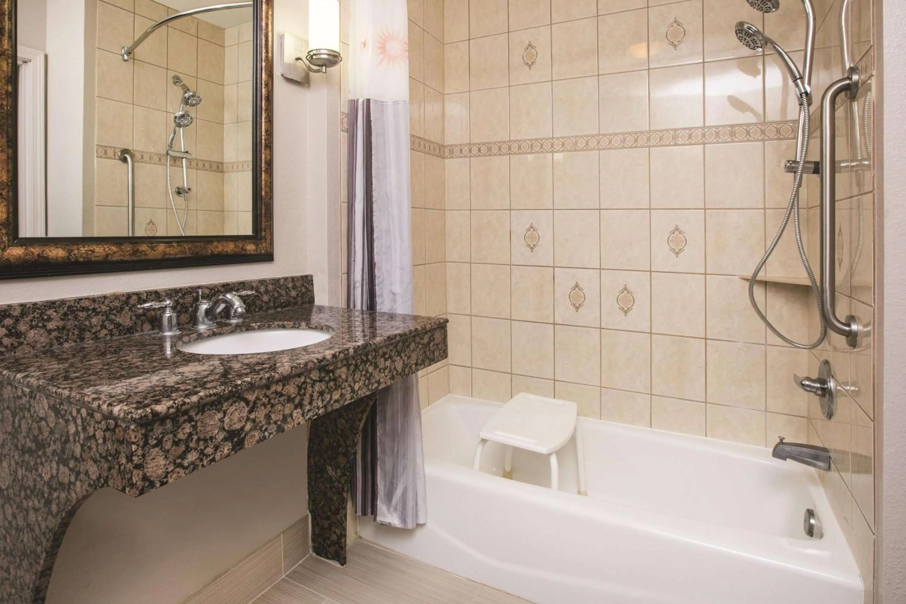 Bathroom in Baymont by Wyndham Dallas South-DeSoto