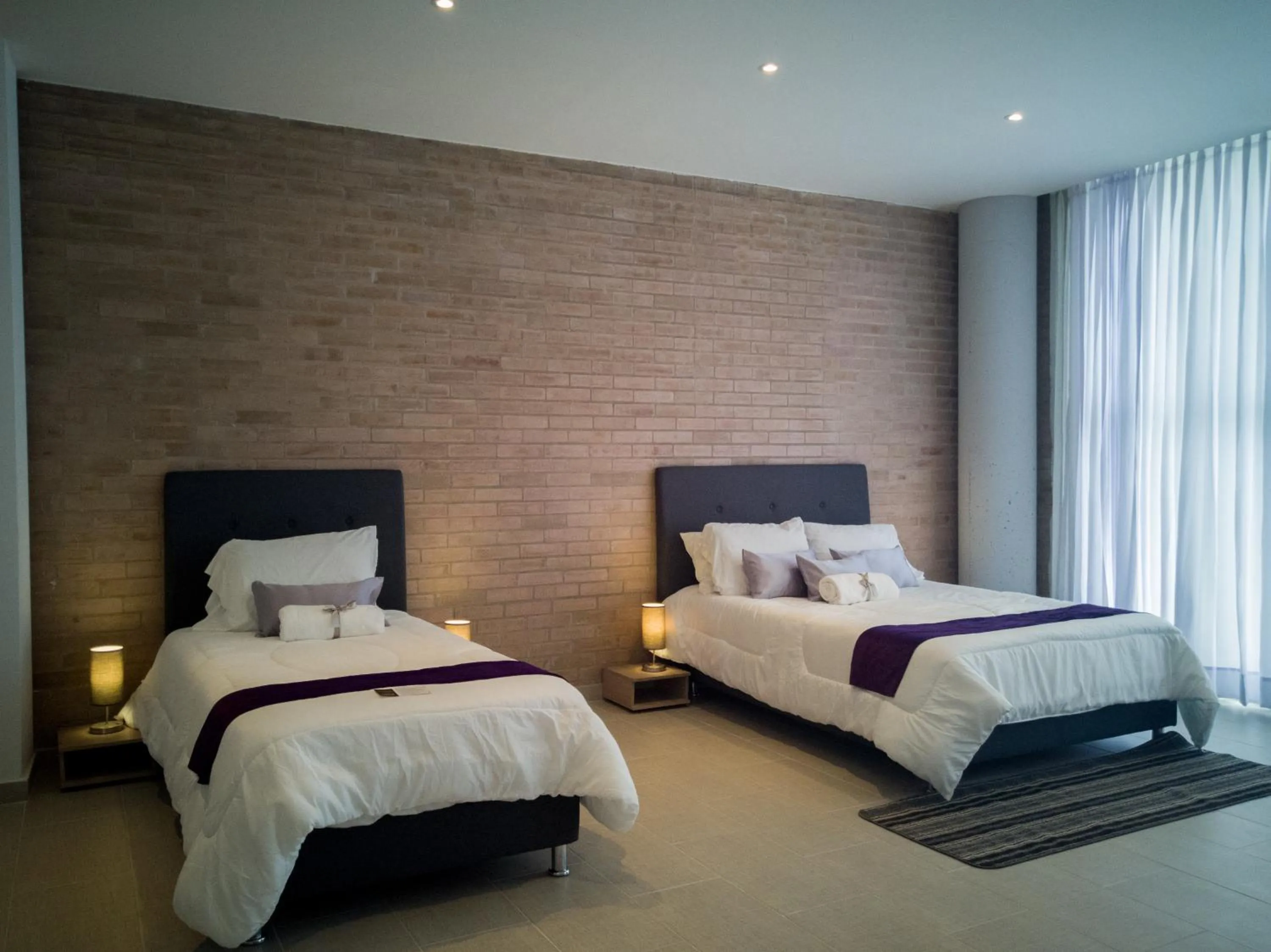 Bed in Hotel Boutique M