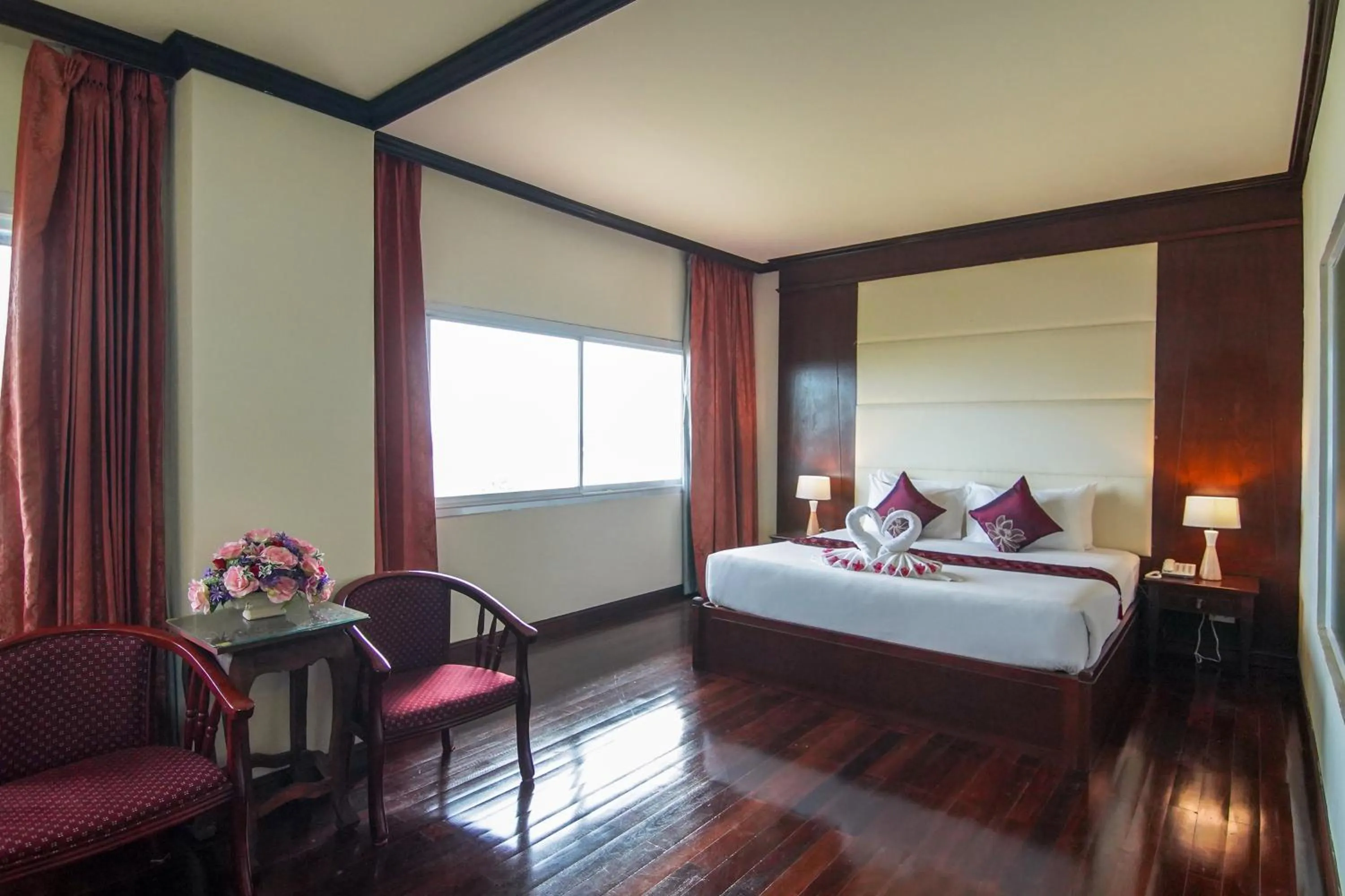 Bed in Arawan Riverside Hotel