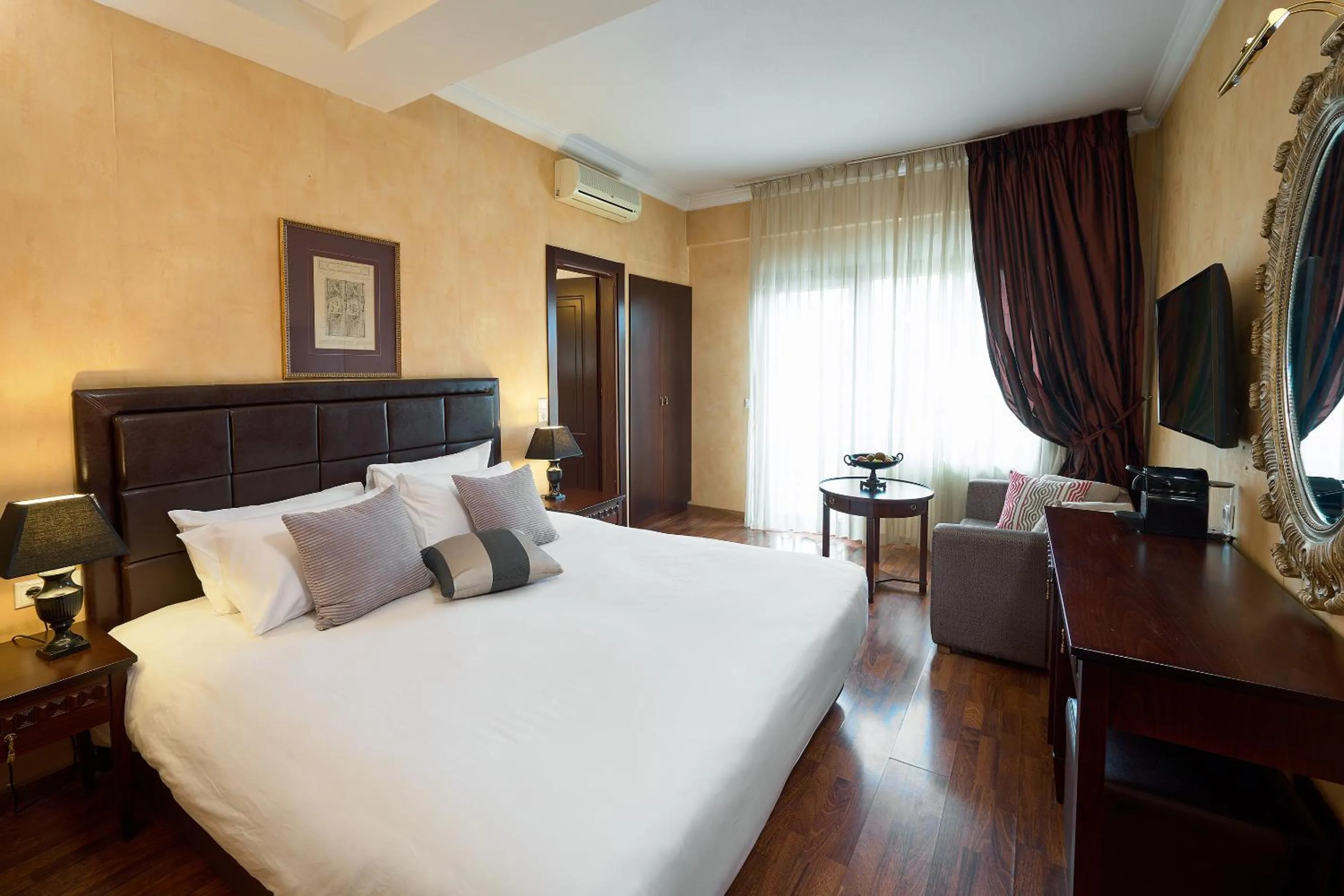 Bed in Olympus Mediterranean Boutique Hotel