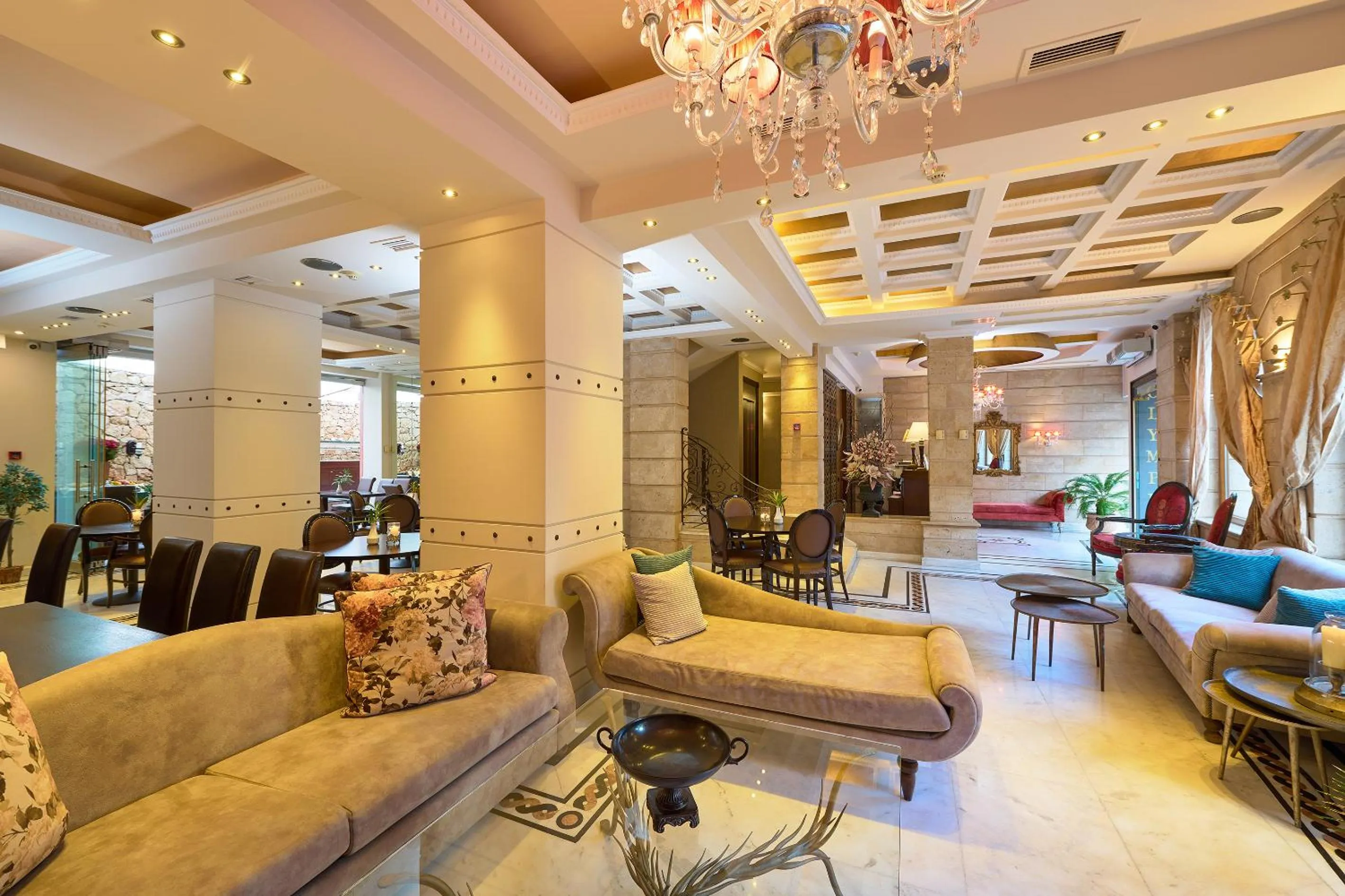 Communal lounge/ TV room in Olympus Mediterranean Boutique Hotel