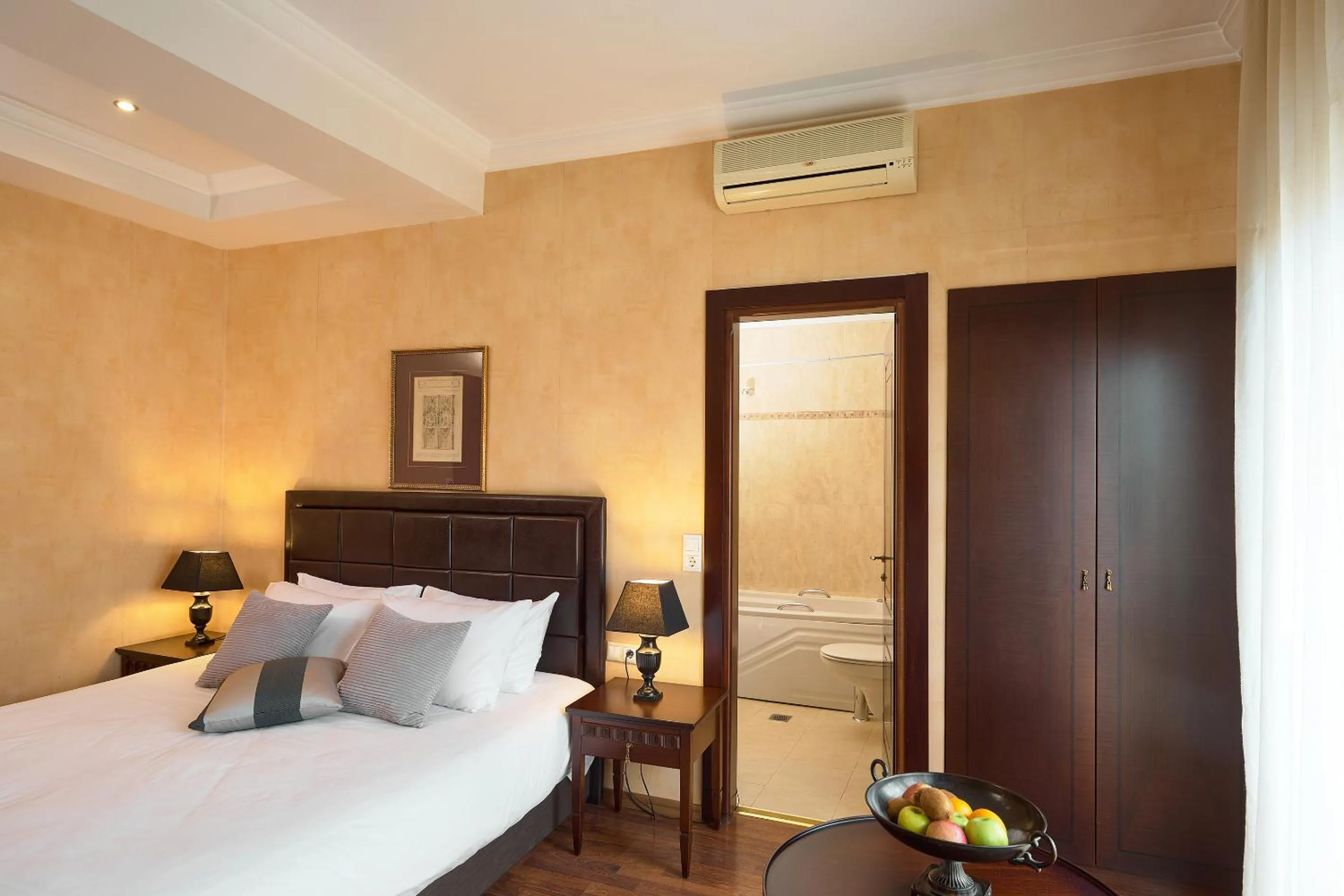 Bed in Olympus Mediterranean Boutique Hotel