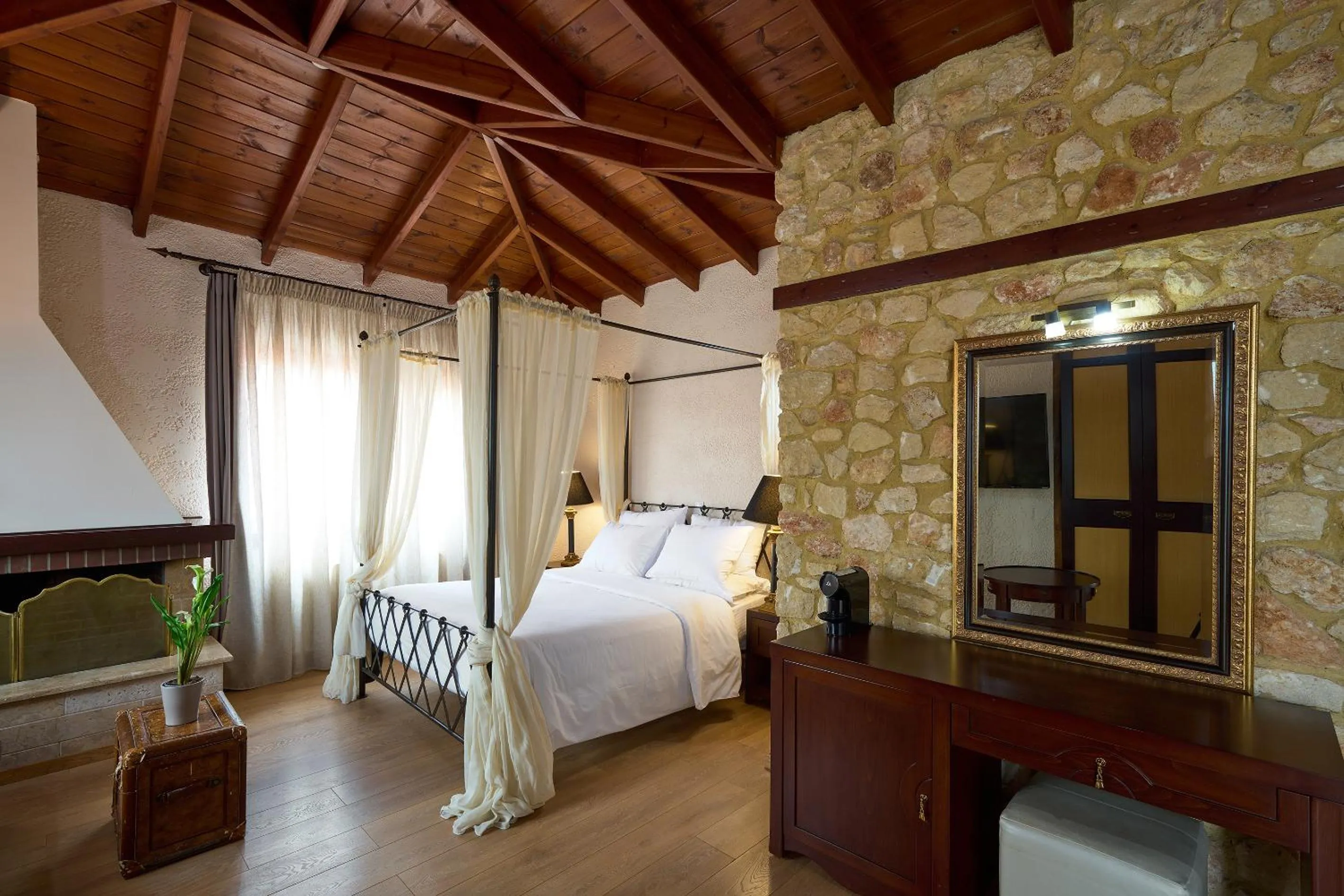 Bed in Olympus Mediterranean Boutique Hotel